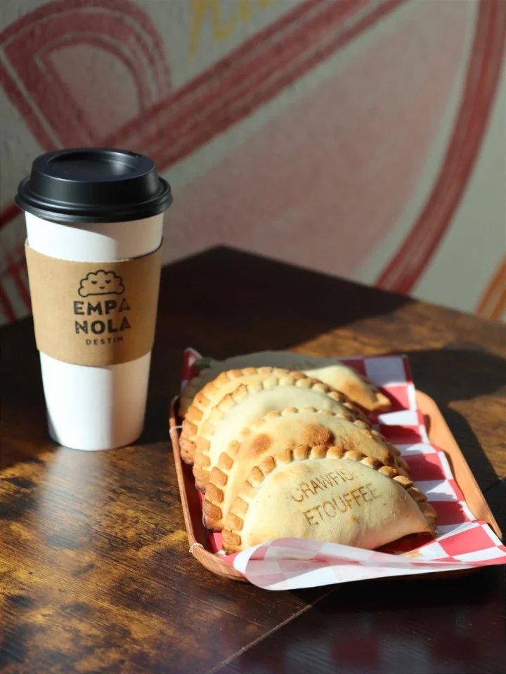 Crawfish etouffee empanadas served with coffee