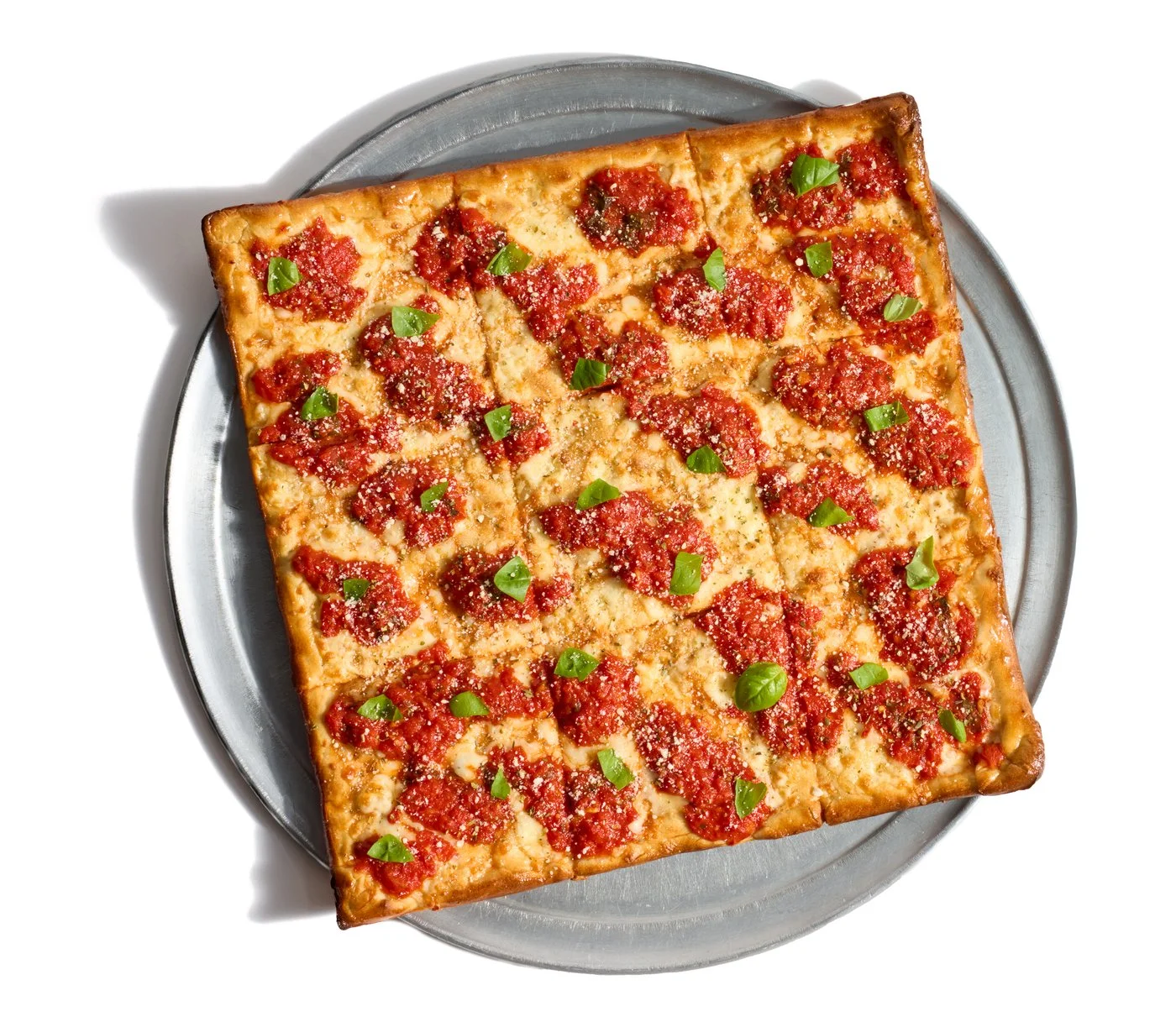 Grandma pie with tomato sauce and basil