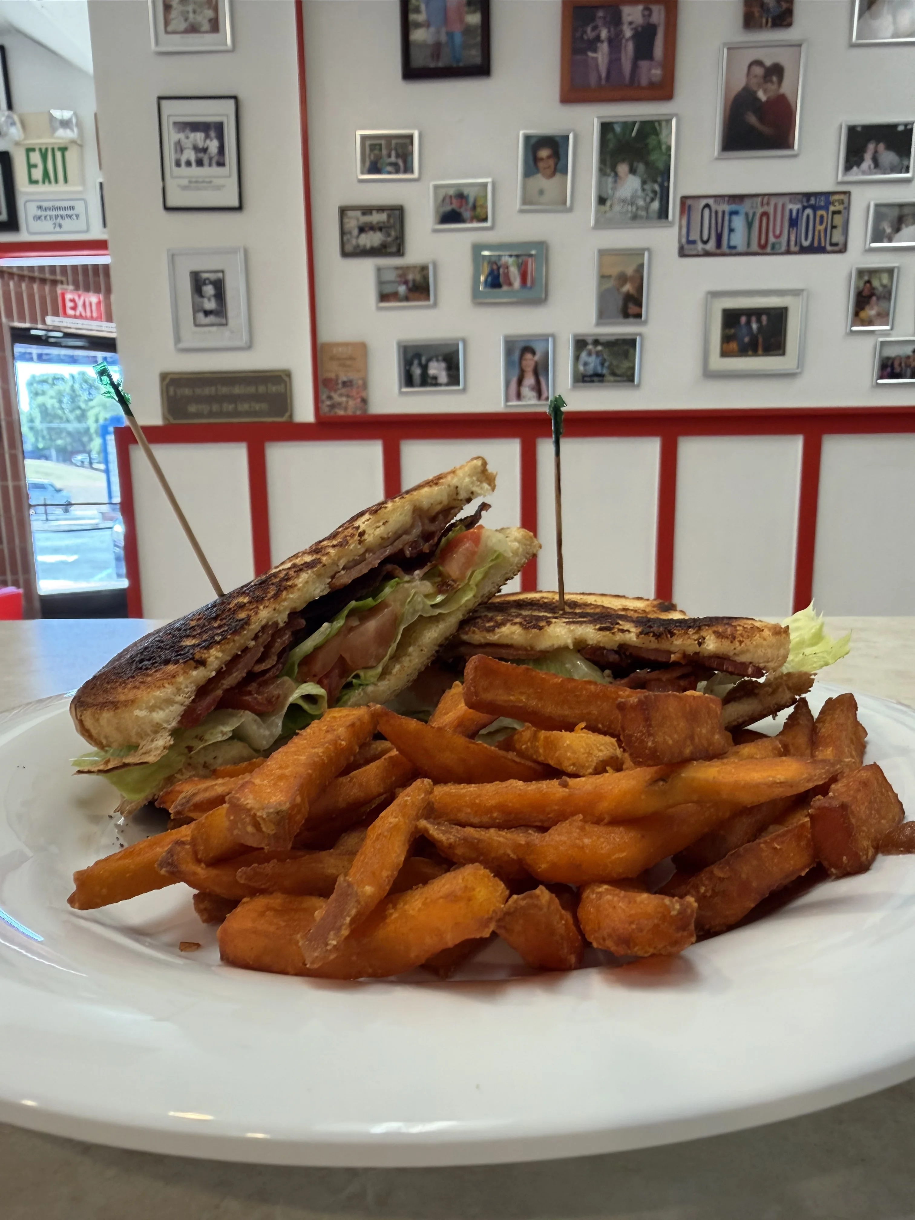 Classic club sandwich with sweet potato fries