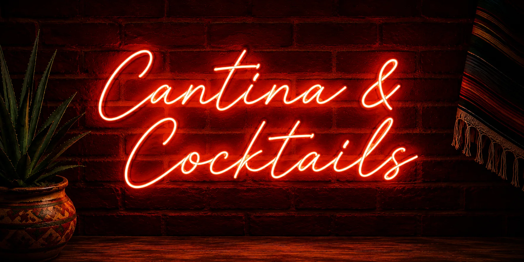 Neon sign for Cantina & Cocktails in a cozy restaurant setting