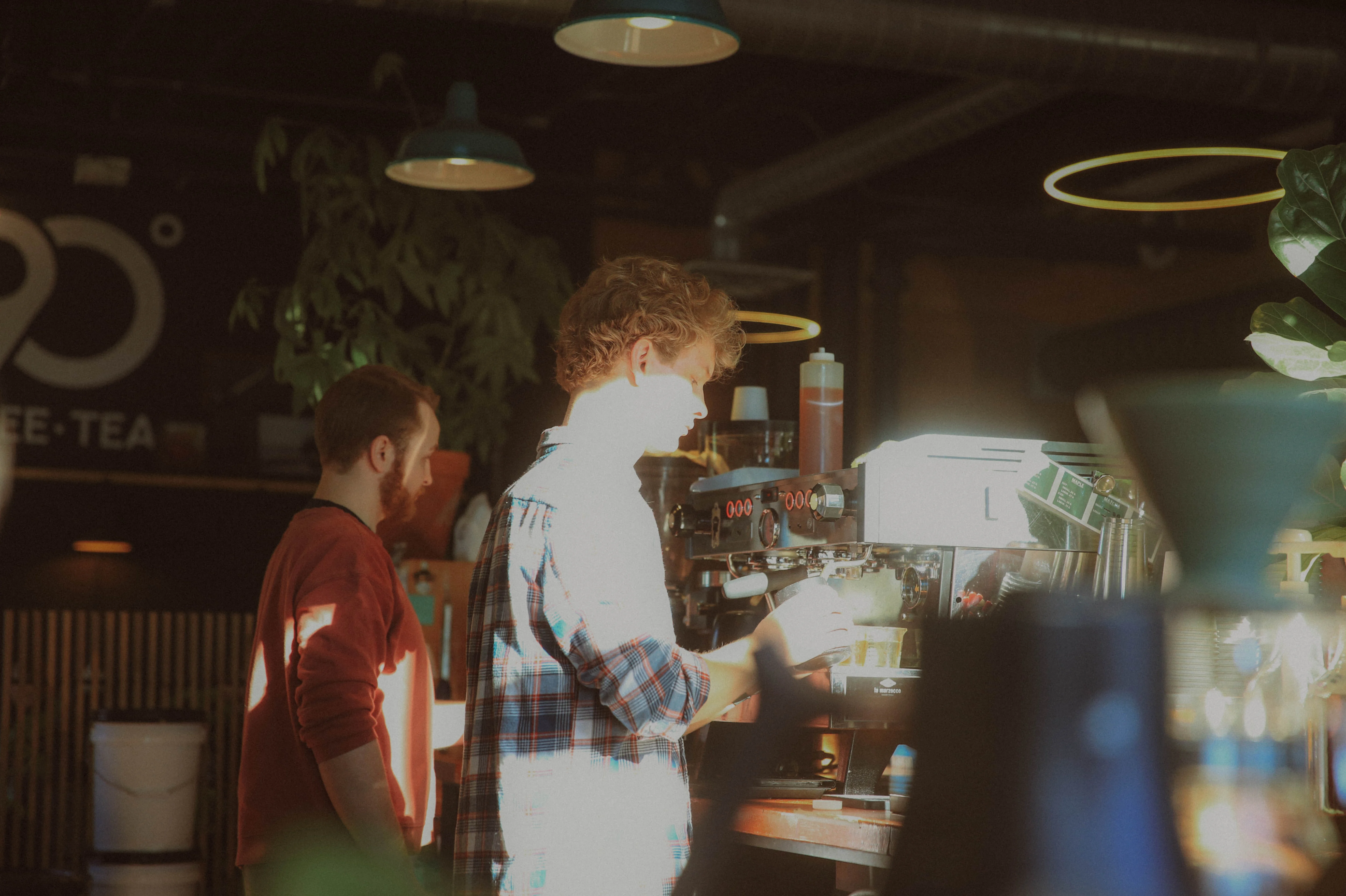 Group of friends celebrating outside 190° Coffee & Tea
