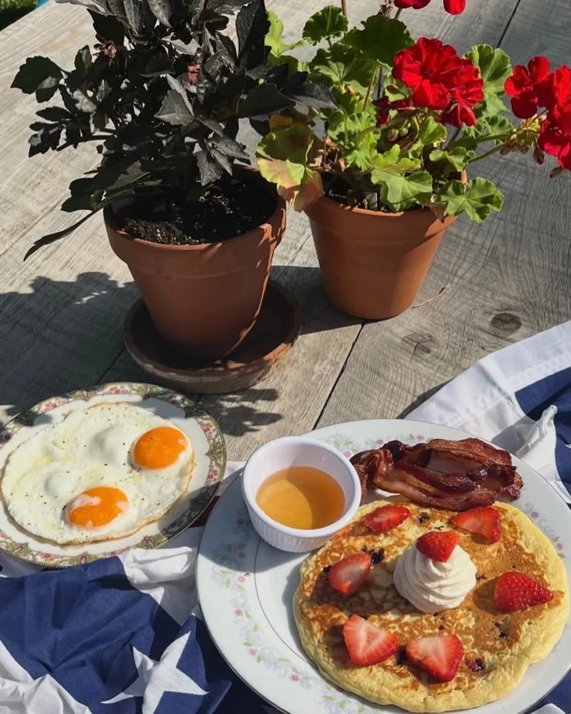 Classic American breakfast with pancakes and eggs