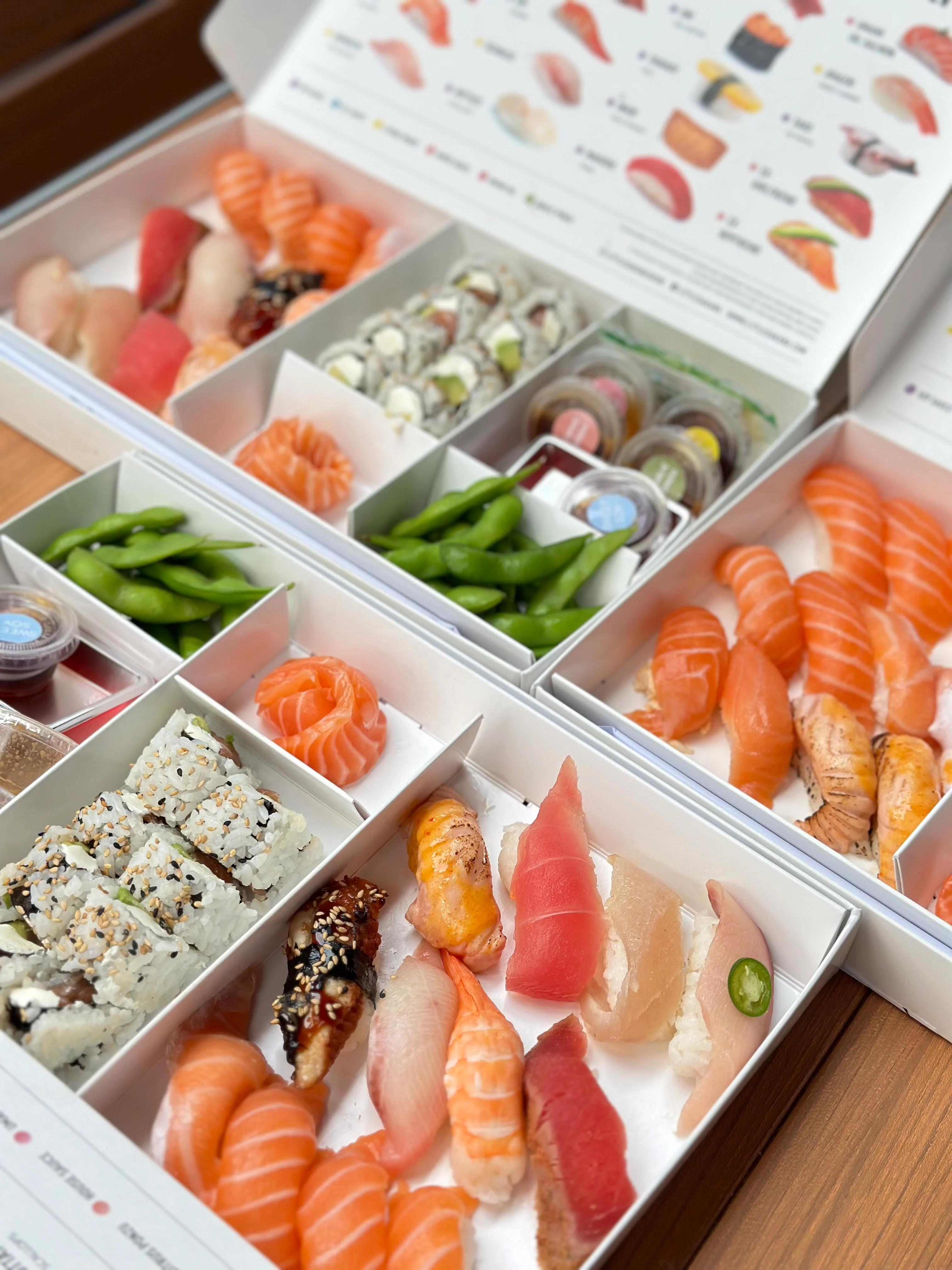 Assorted sushi platter featuring nigiri and rolls