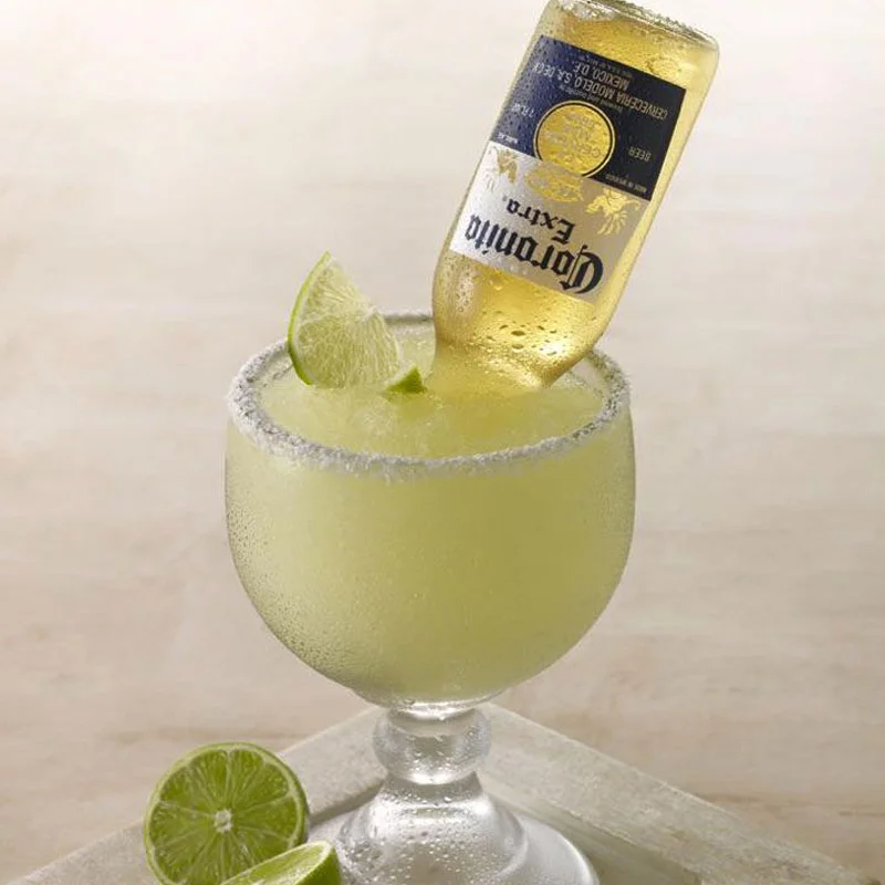 Refreshing margarita cocktail with a beer bottle