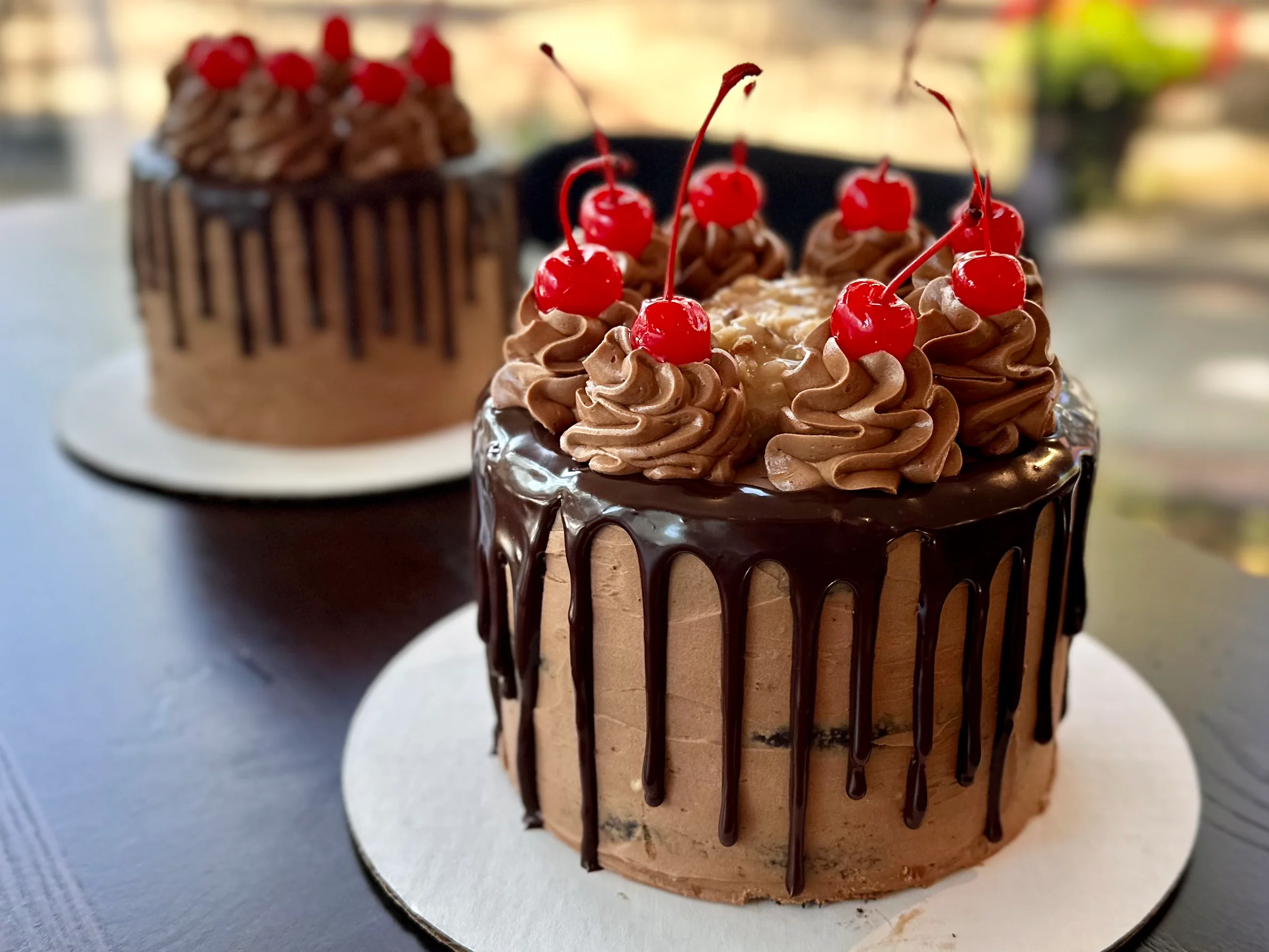 Decadent chocolate cake with cherries on top