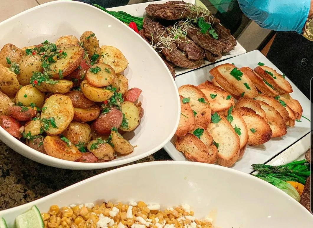 Grilled steak with roasted potatoes and crostini