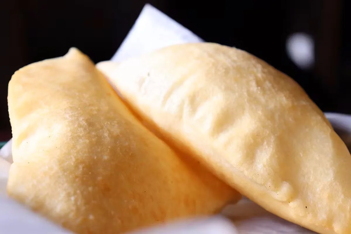 Golden fried Indian samosas served warm