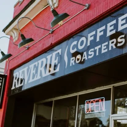 Exterior of Reverie Coffee Roasters with open sign