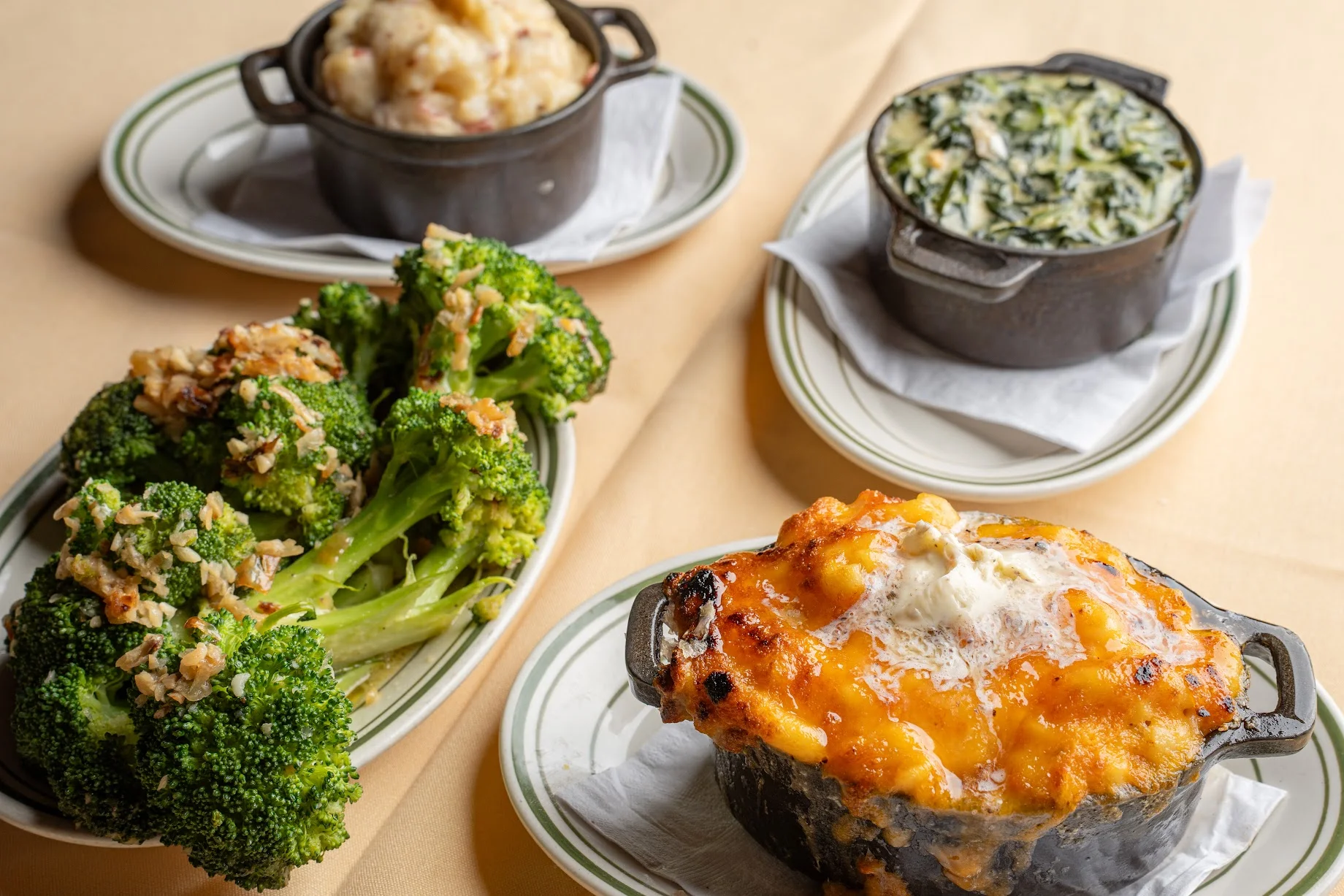 Mac and cheese, broccoli, spinach, mashed potatoes