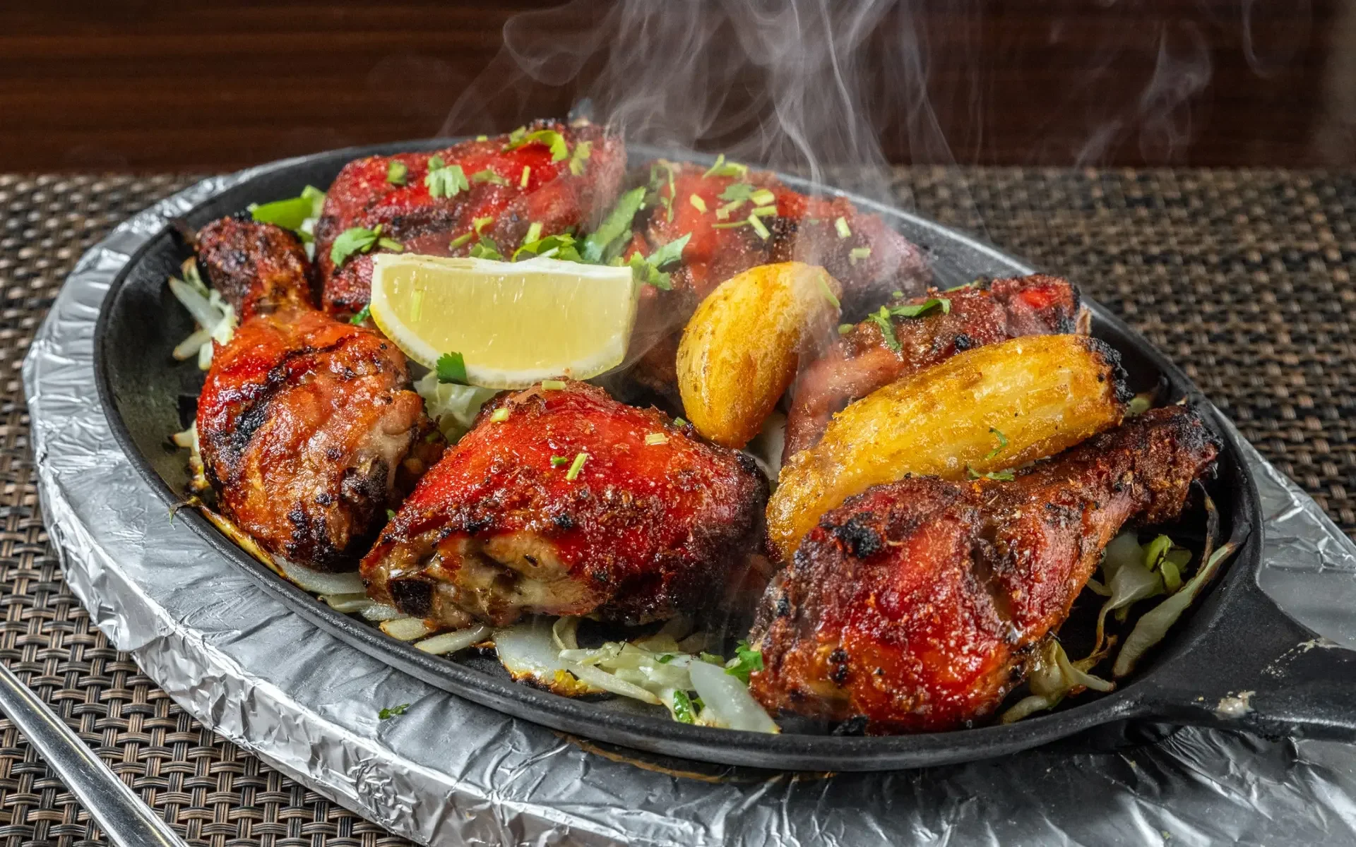 Sizzling Jamaican jerk chicken platter with plantains