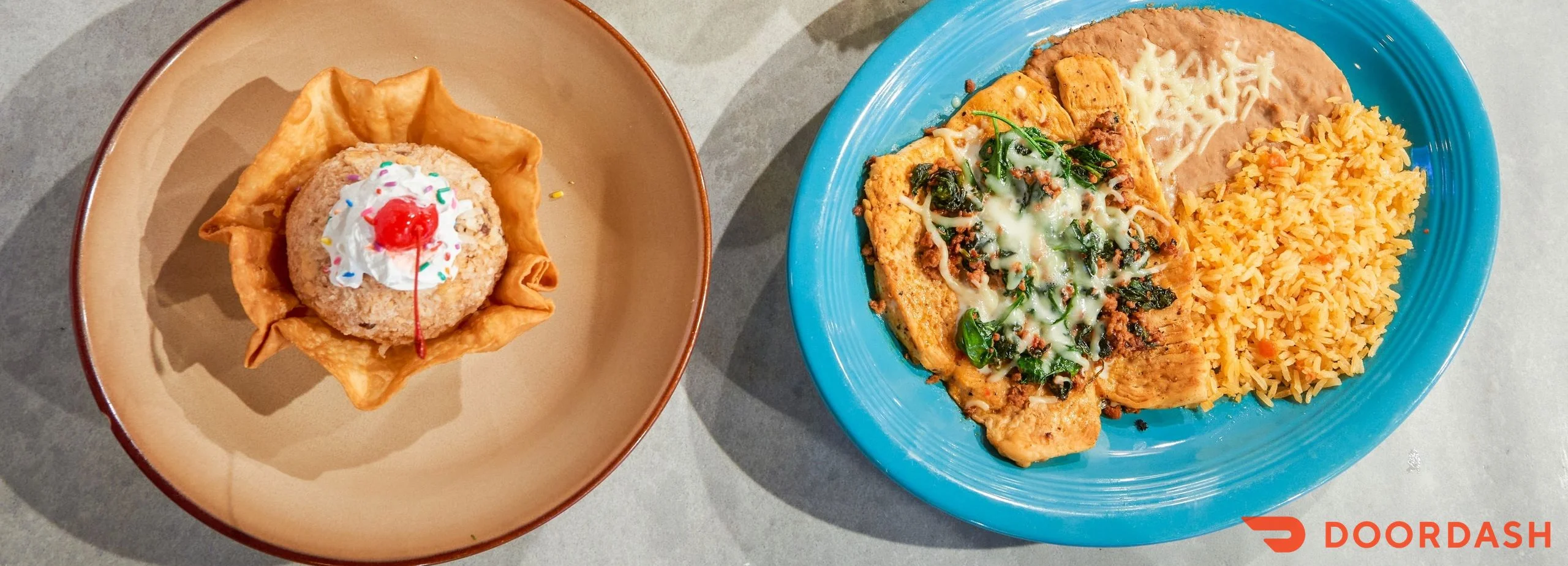 Mexican enchiladas with rice and dessert in a vibrant setting
