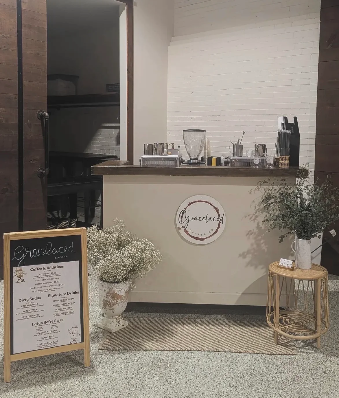 Cozy coffee shop counter with menu and decor