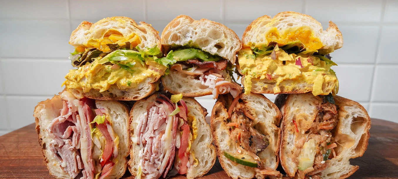 Seven beautiful sandwiches stacked