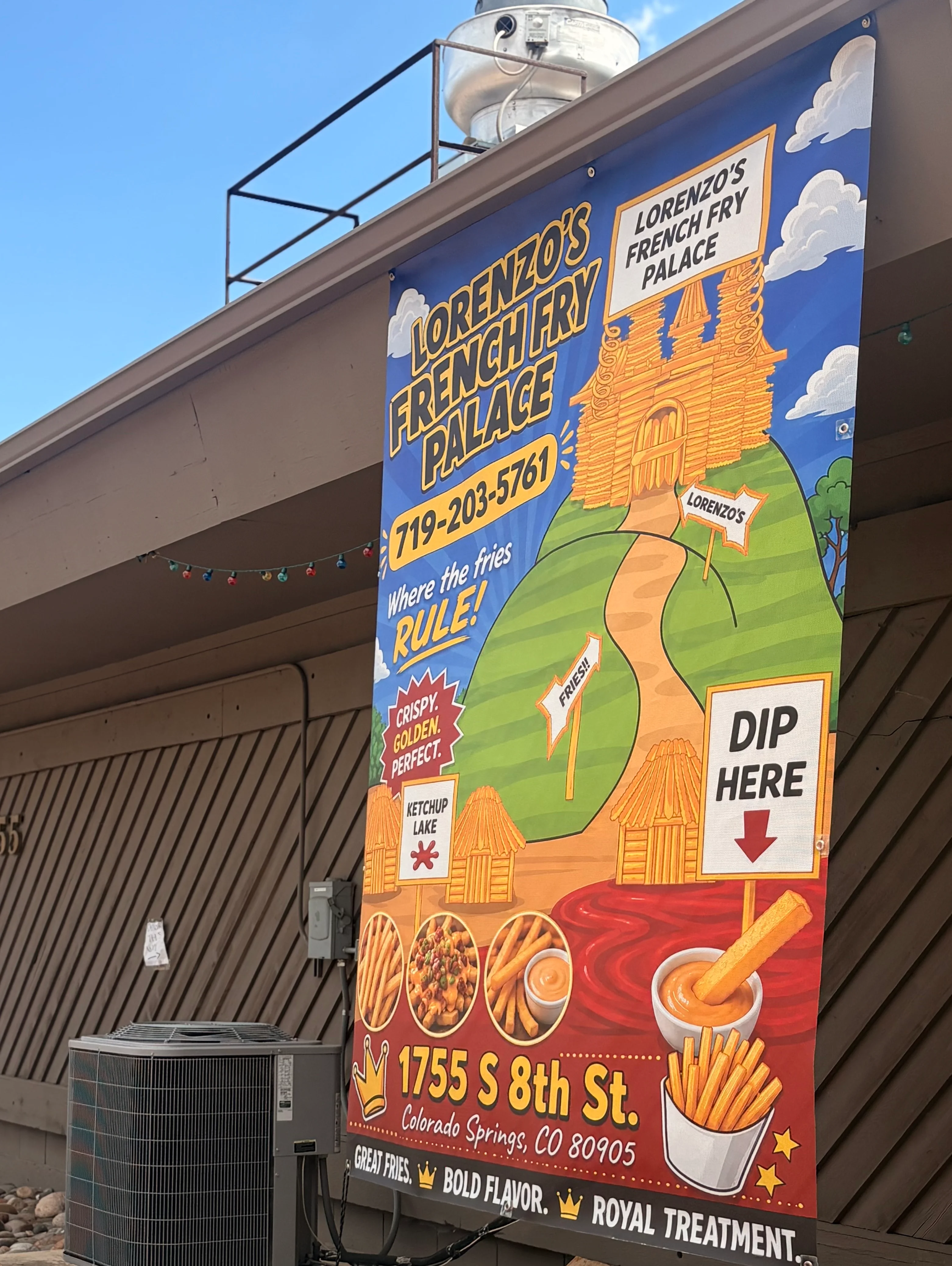 Colorful restaurant signage for Lorenzo's French Fry Palace in Colorado Springs