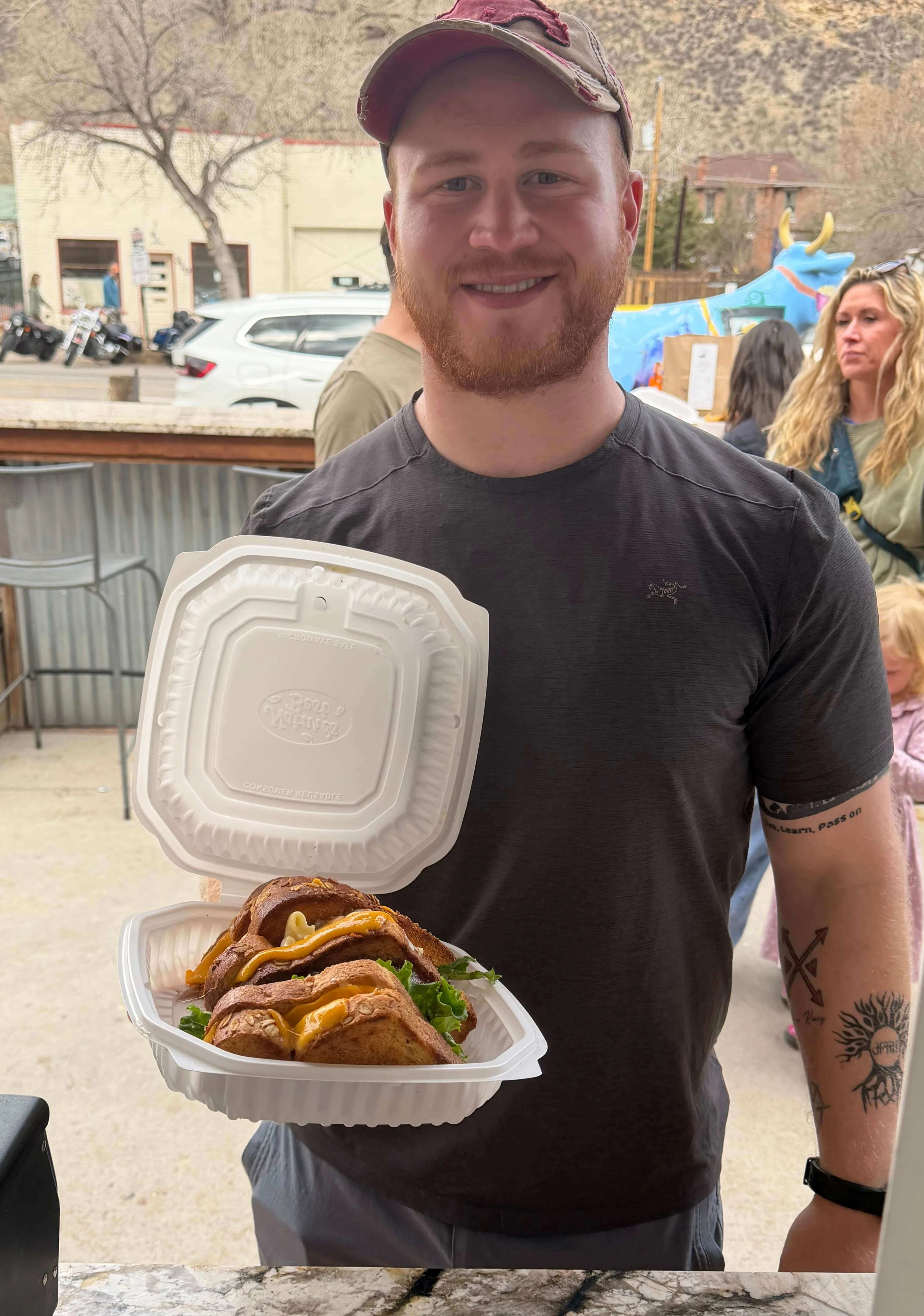 Delicious street tacos served in a takeout container