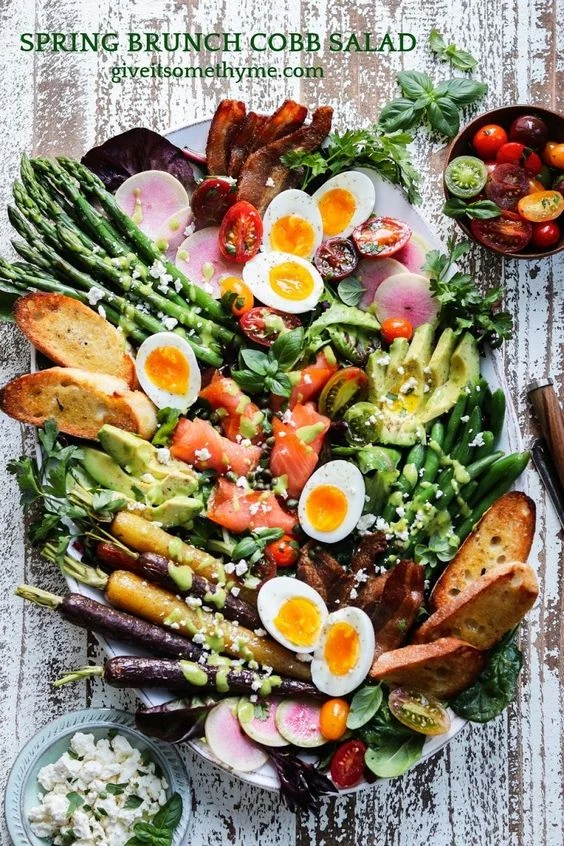 Vibrant spring Cobb salad with fresh vegetables and eggs