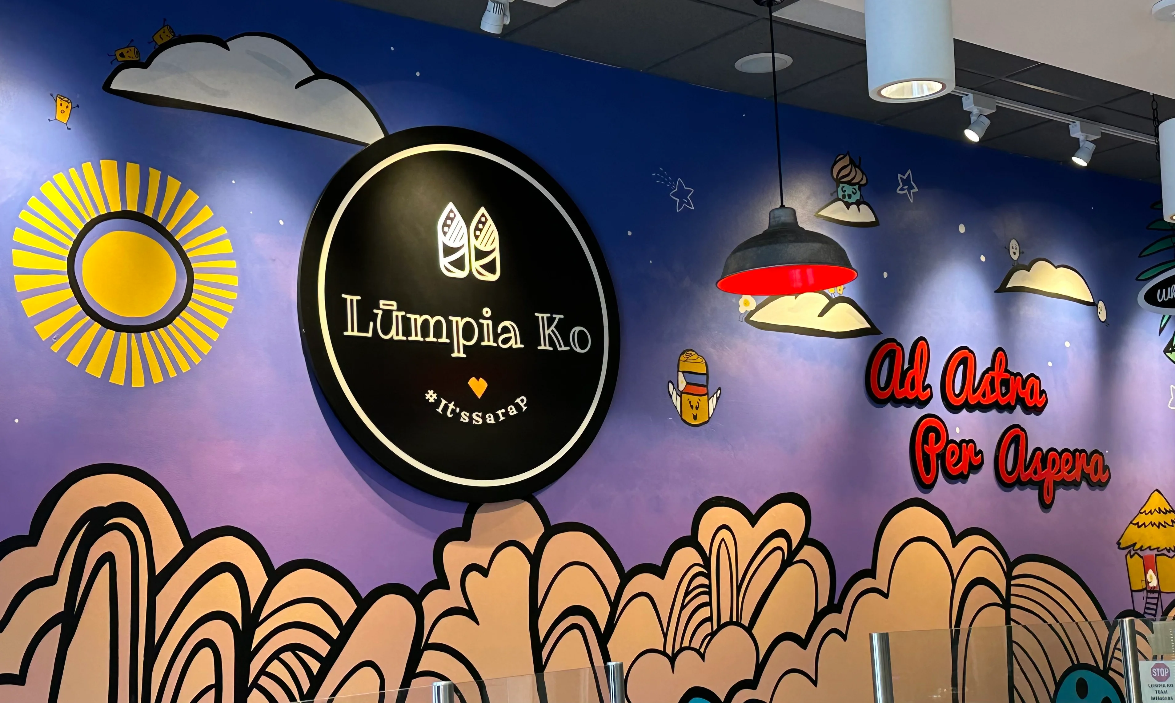 Colorful mural in a restaurant featuring Filipino cuisine