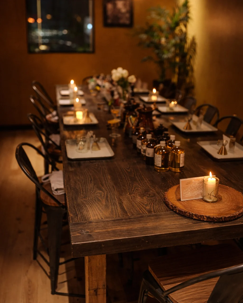 Elegant dining setup with candles and decor in a cozy restaurant