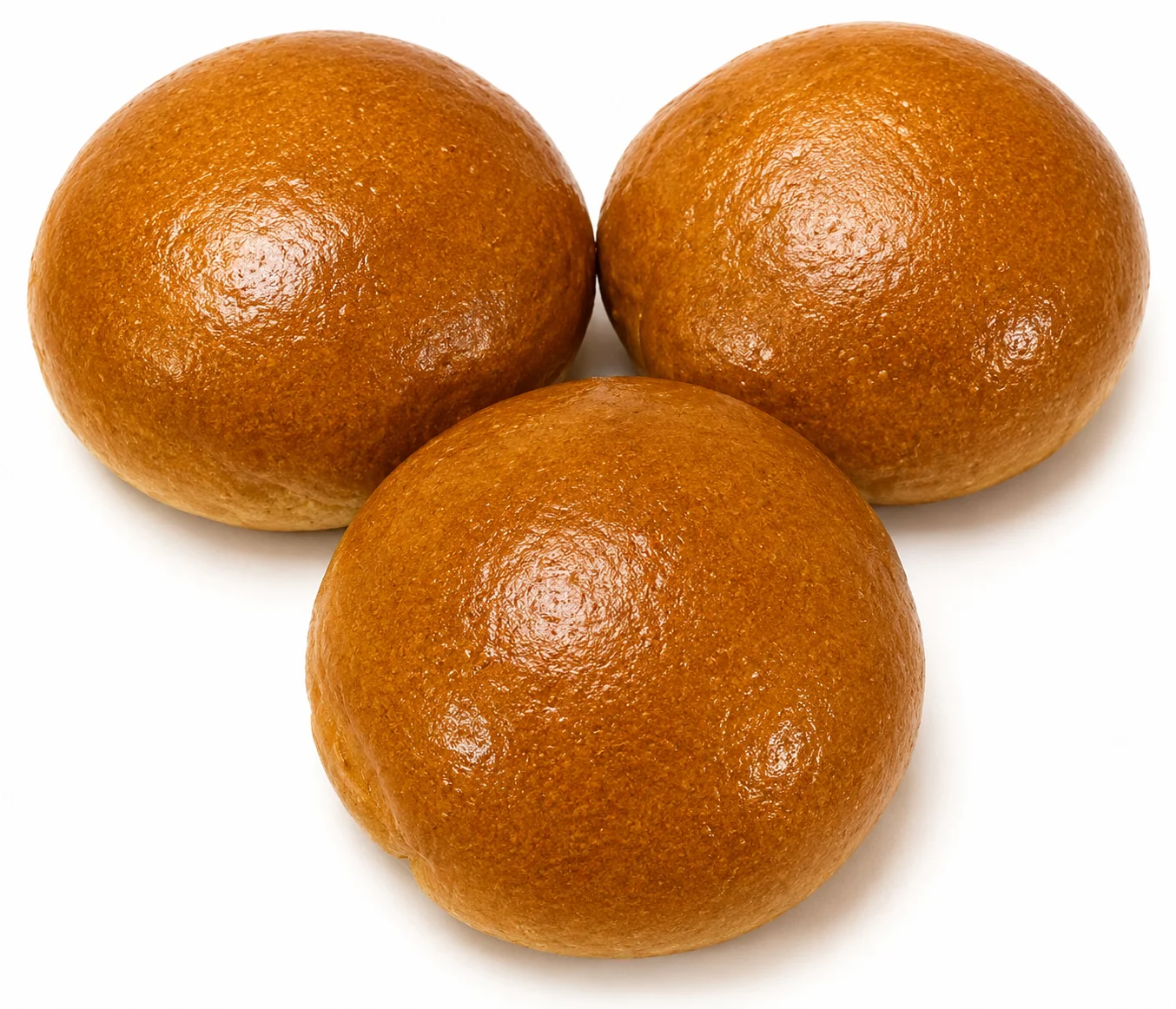 Three shiny, round, golden-brown buns on a white background.