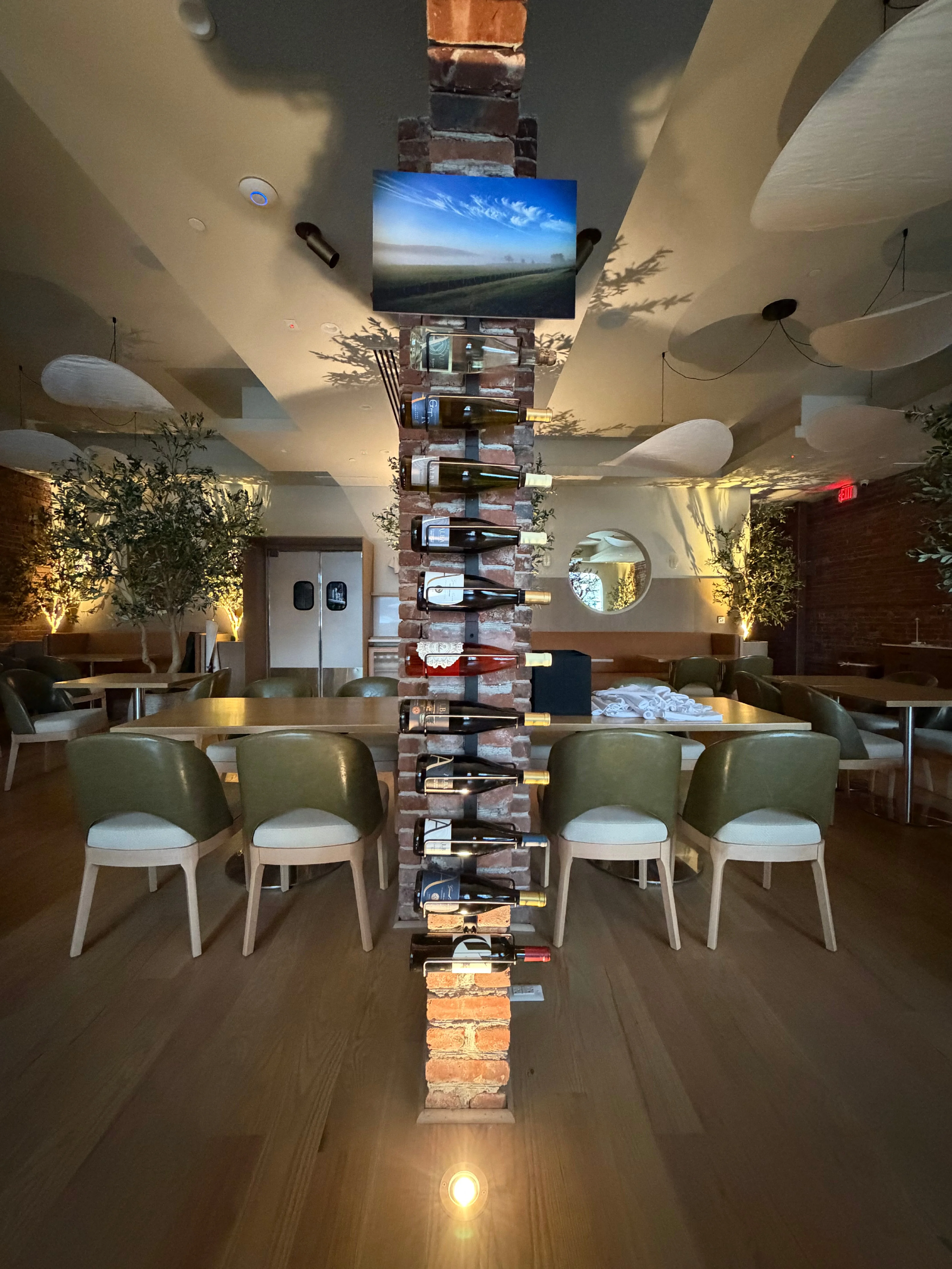 Delicious gourmet burger with fresh toppings on a wooden table
