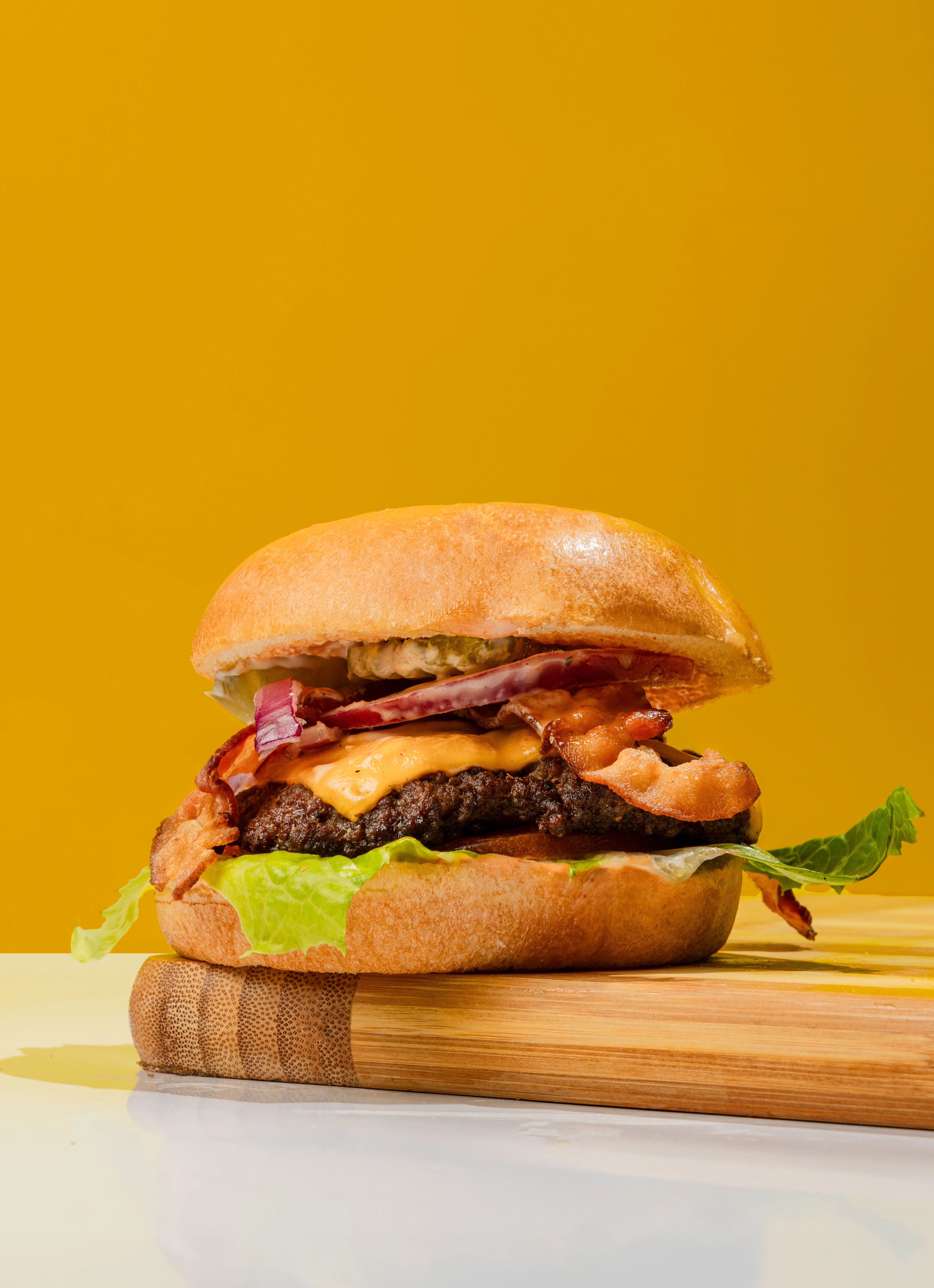 Juicy cheeseburger with bacon and lettuce