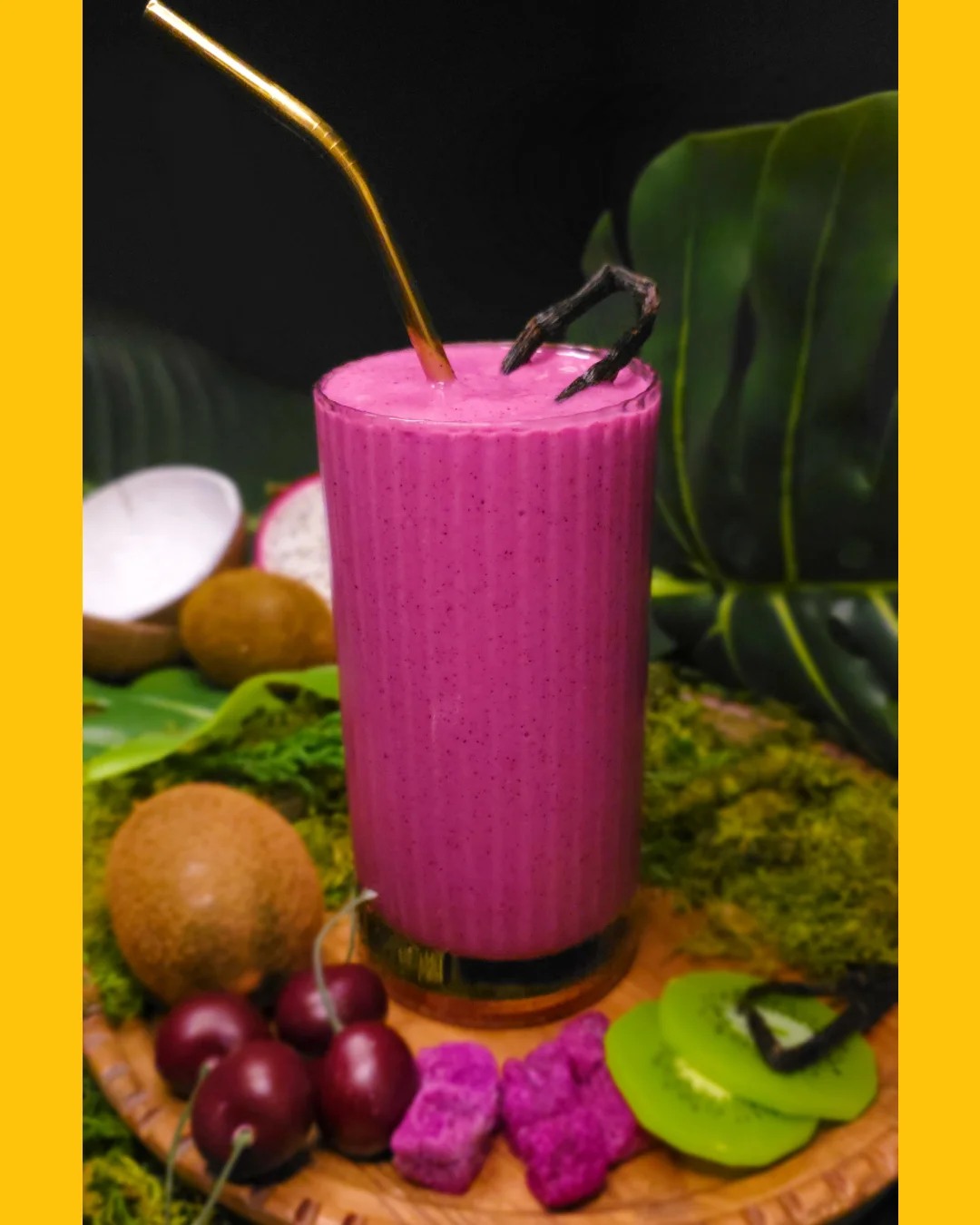 Vibrant tropical smoothie in a glass with exotic fruits