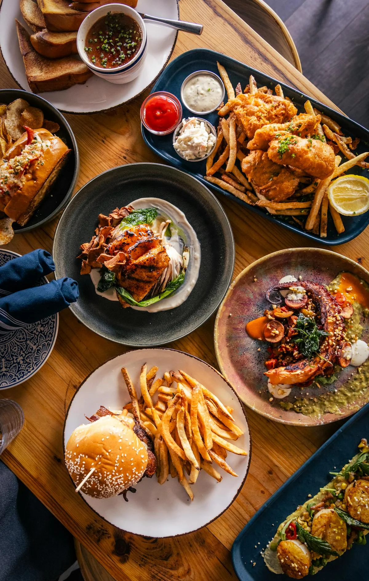 Assorted dishes including fried chicken and seafood platter