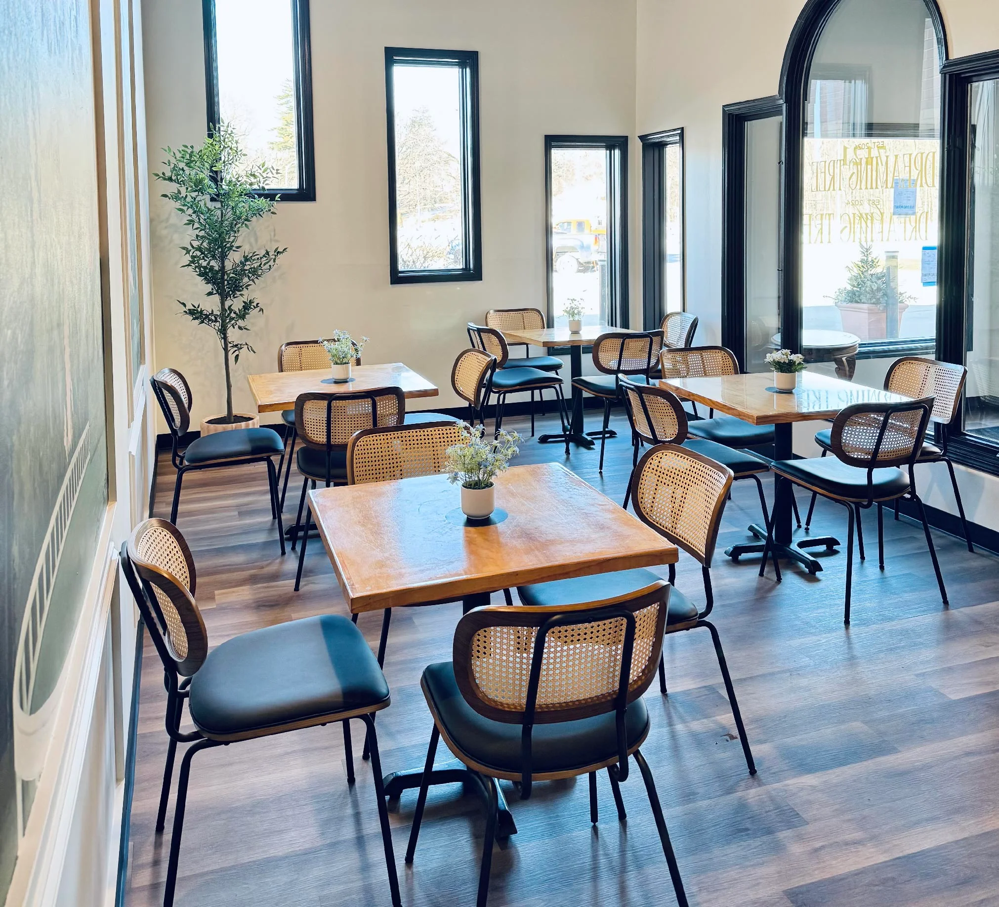 Cozy restaurant interior with modern decor and natural light