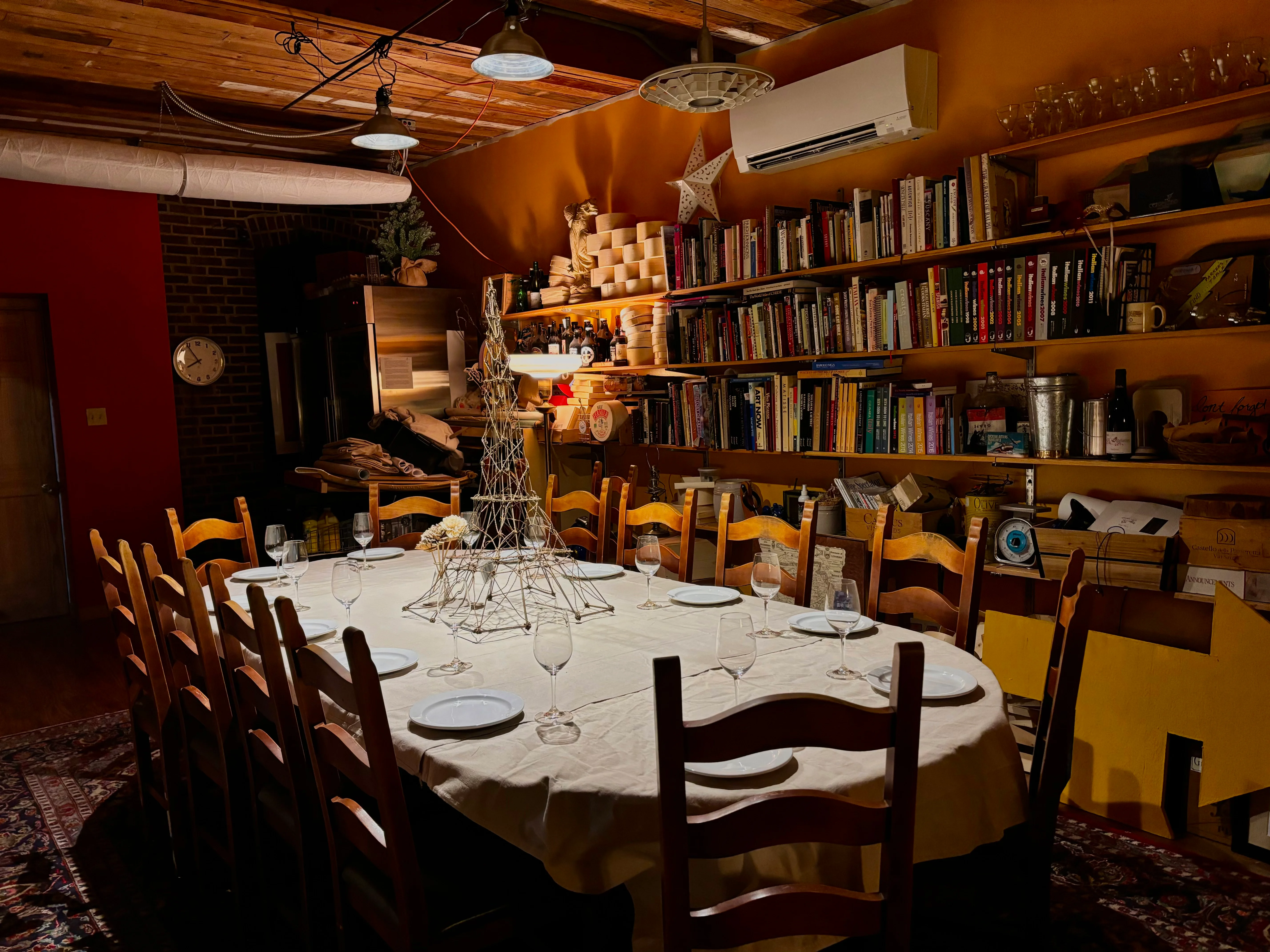 Cozy dining area with rustic decor and a large table set for a meal