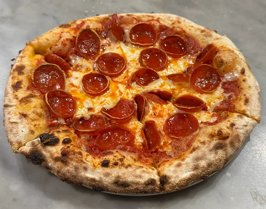 Pepperoni pizza from a wood-fired oven