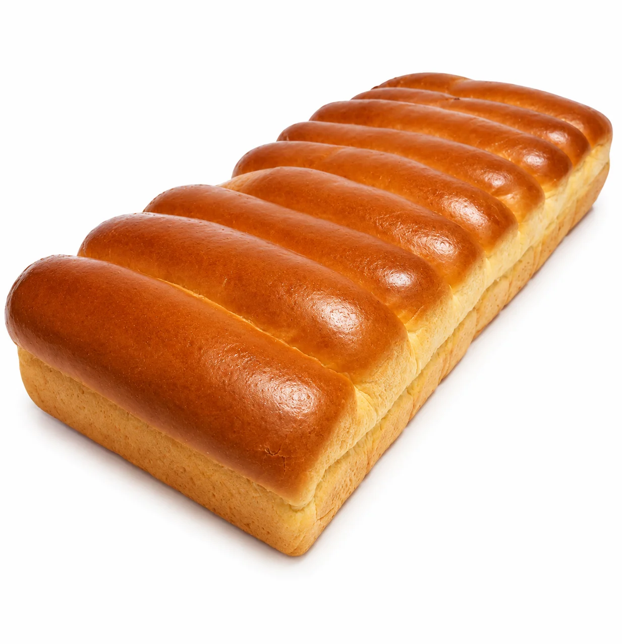Freshly baked loaf of soft, golden bread with a smooth texture.