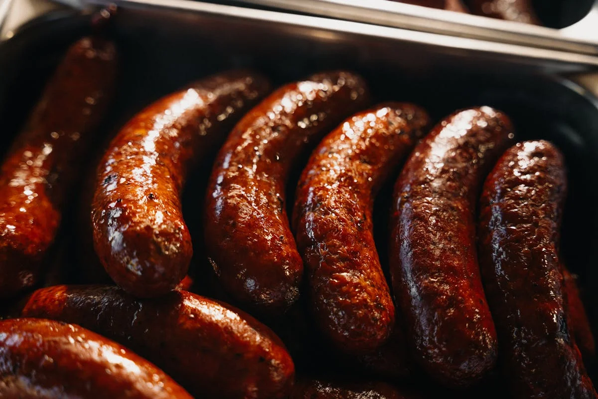 Grilled Polish kielbasa sausages on display