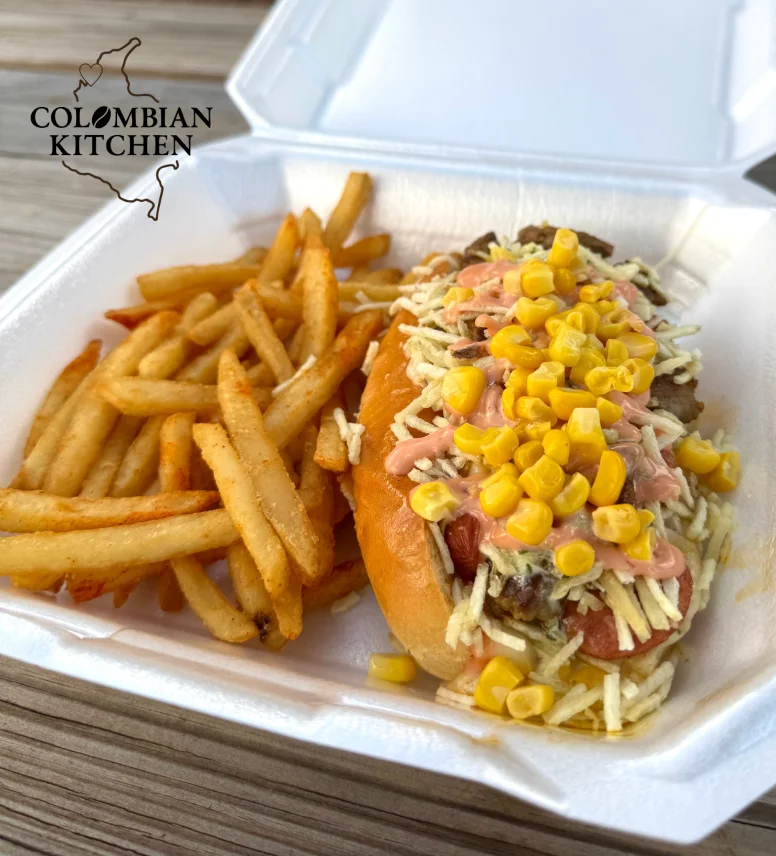 Colombian hot dog with toppings and fries
