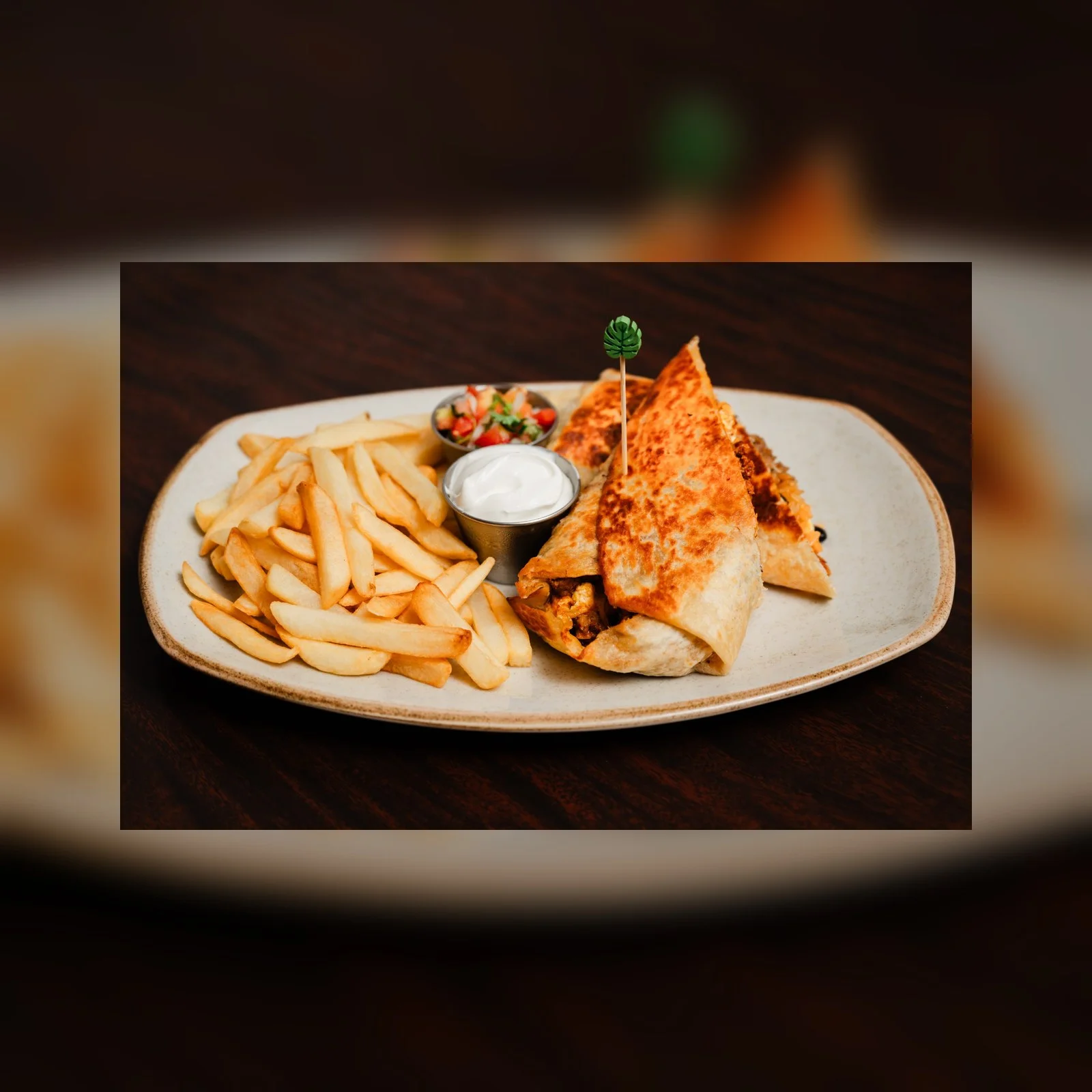 Crispy chicken burrito with fries and salsa