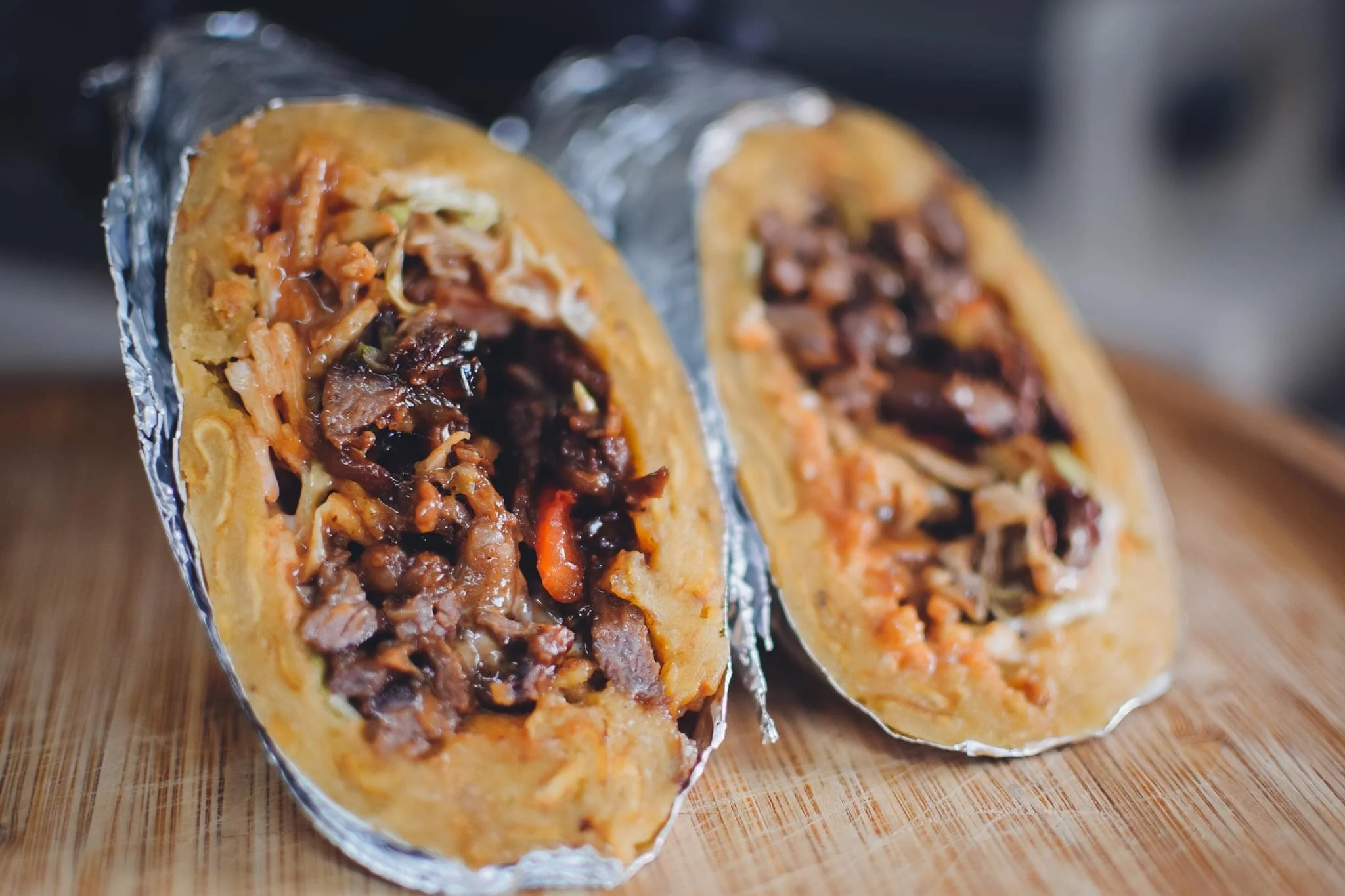 Delicious burritos filled with savory meats and fresh toppings