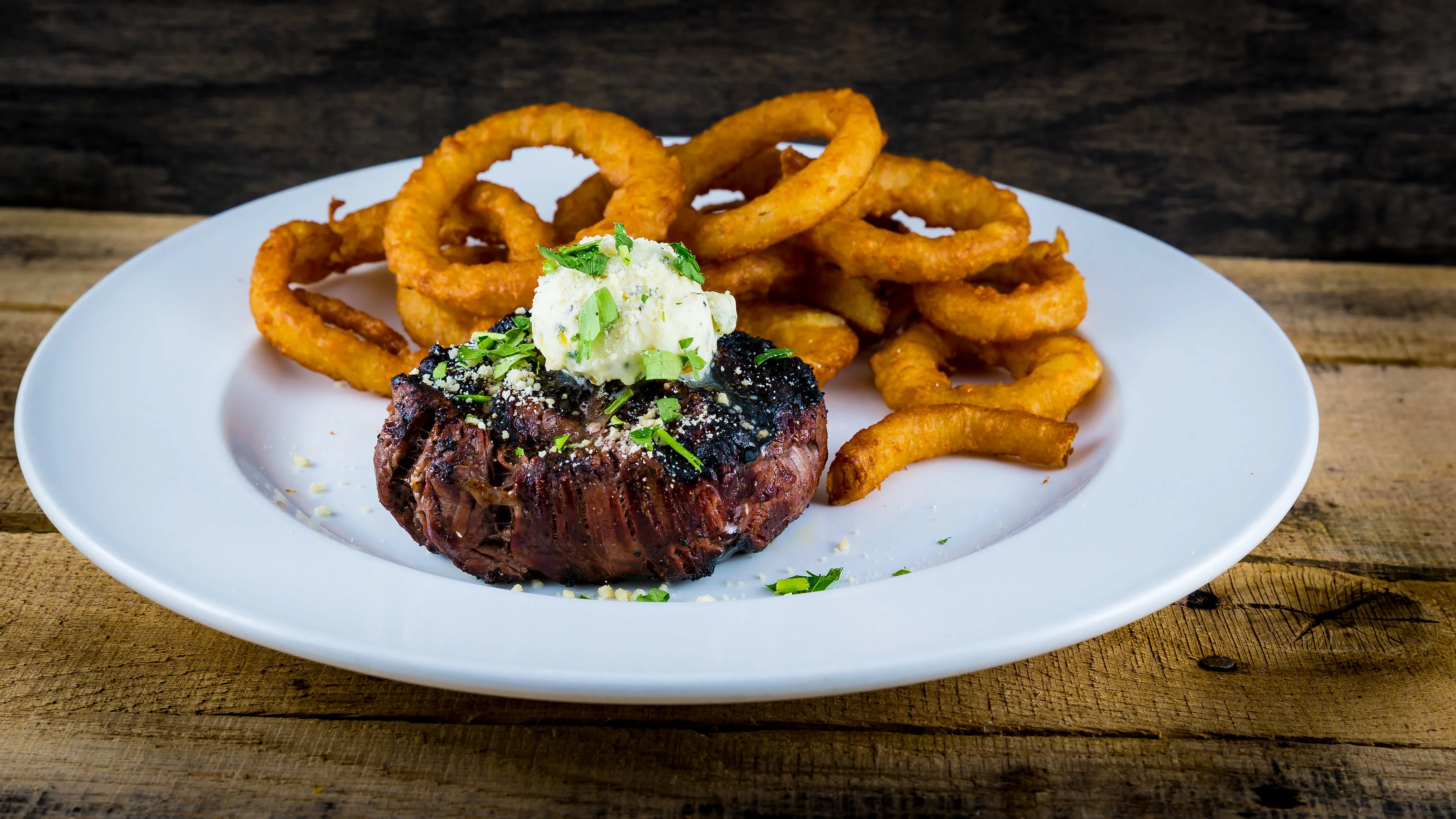 Grilled filet mignon with onion rings