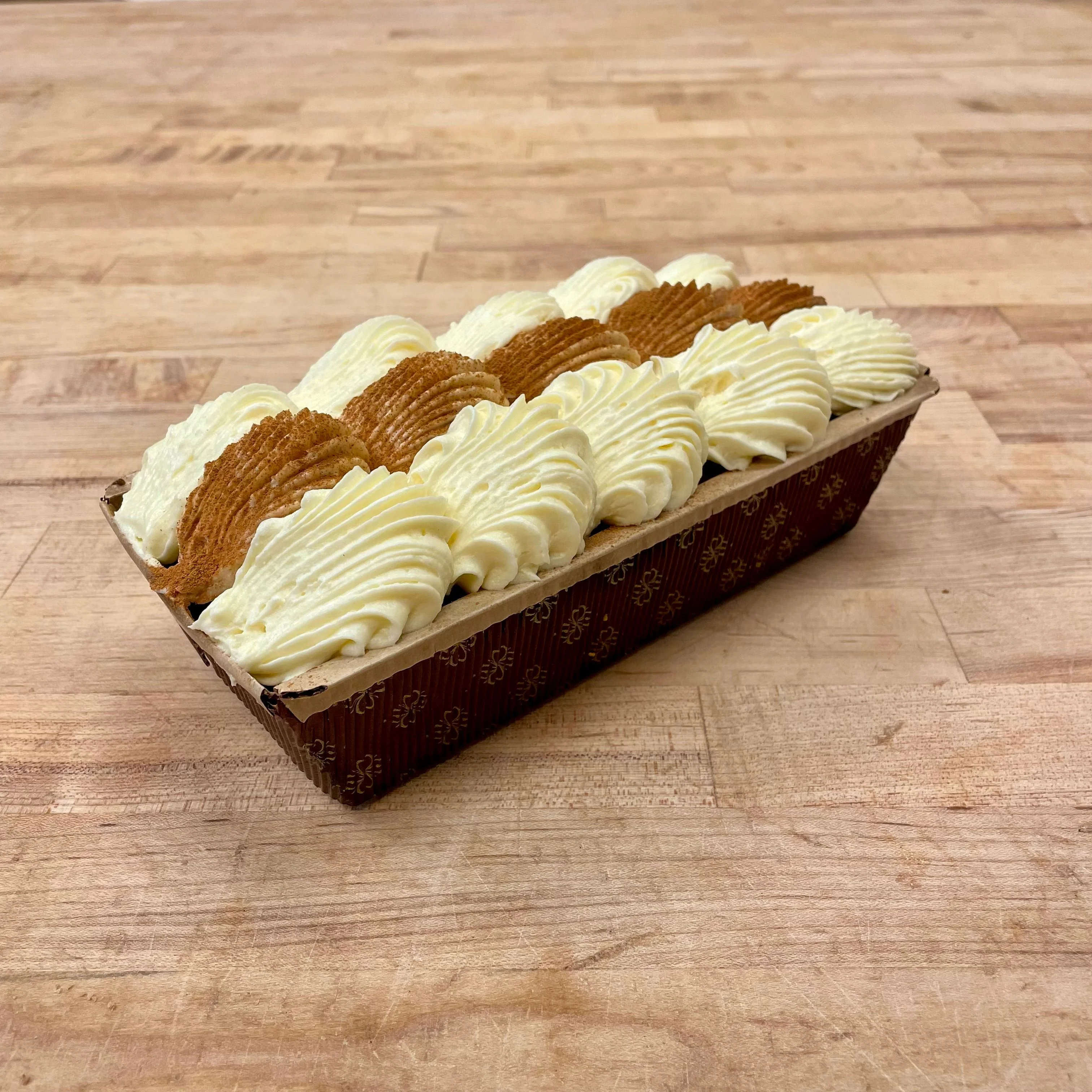 Delicious Italian tiramisu in a decorative tray