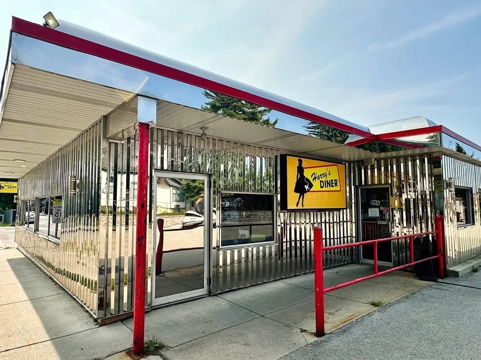 Exterior view of Harry's Diner with shiny metal facade