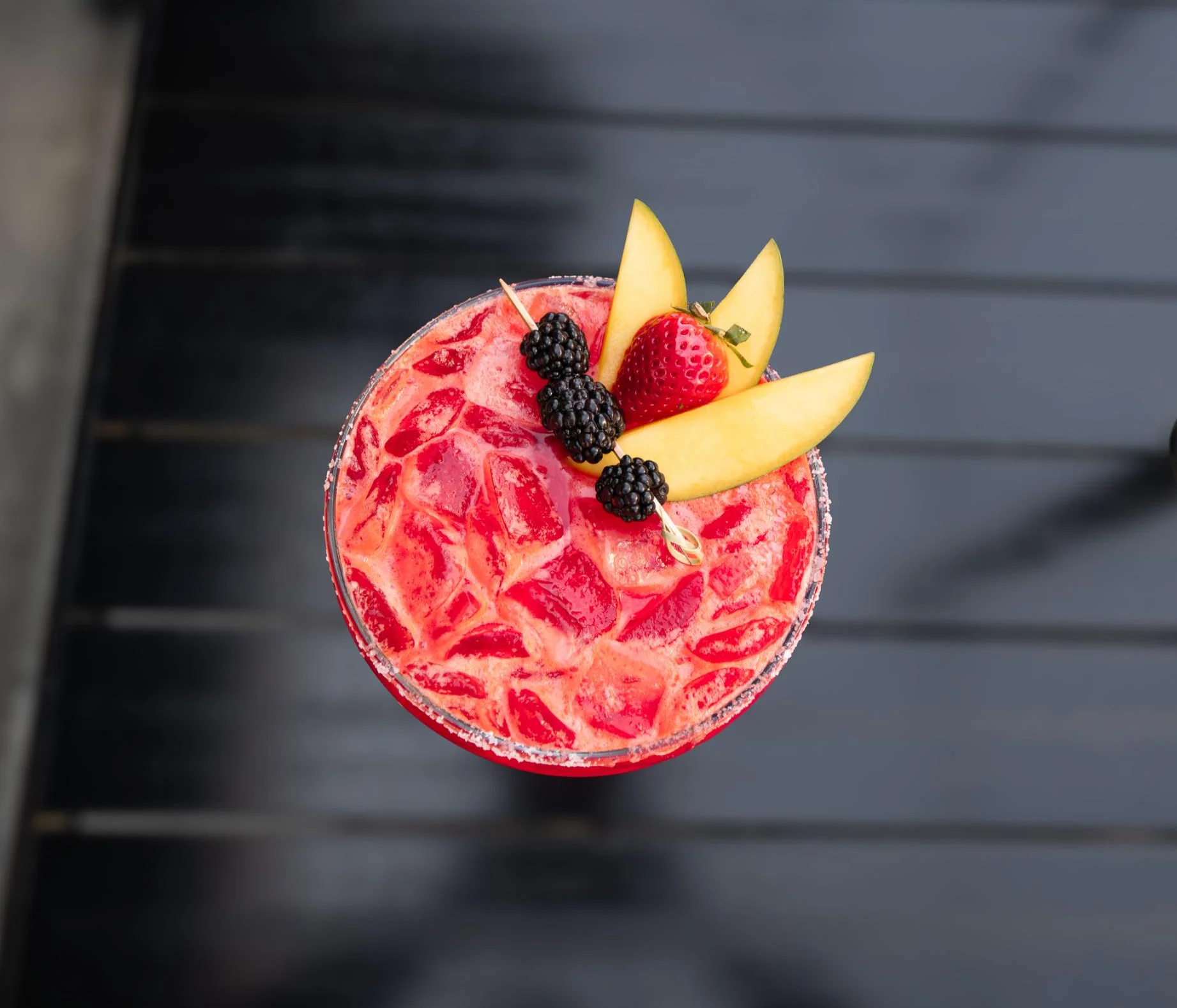 Refreshing summer cocktail with fruit garnish