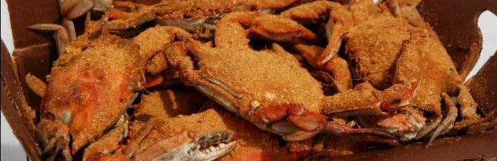 Spicy Cajun blue crabs served in a rustic box