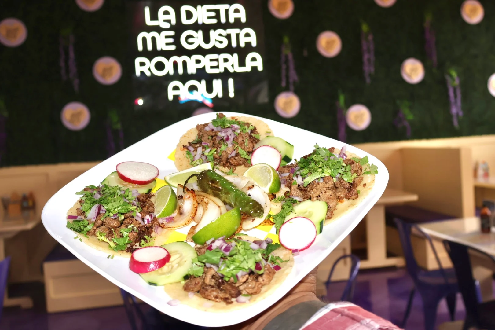 Delicious gourmet burger with fresh toppings on a wooden table