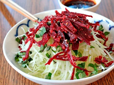 Chinese shredded beef salad with cabbage and herbs