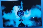 Vibrant cocktail with smoke and blue lighting