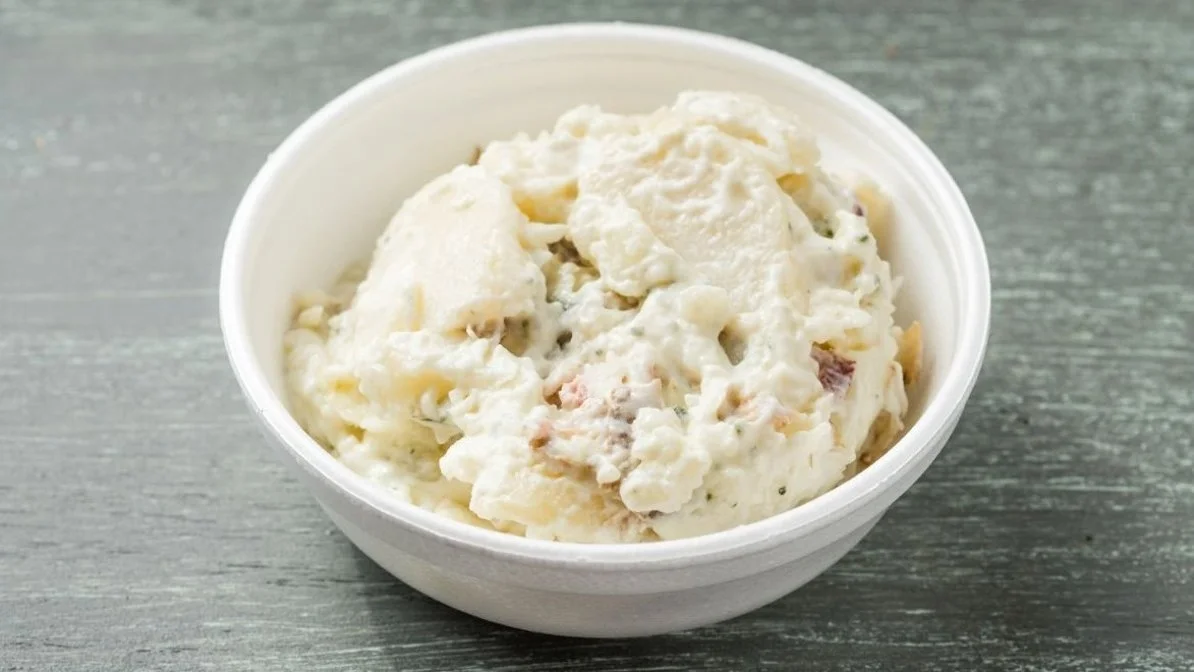 Potato salad from VooDoo BBQ in Pensacola, a creamy Southern-style BBQ side made with tender potatoes.