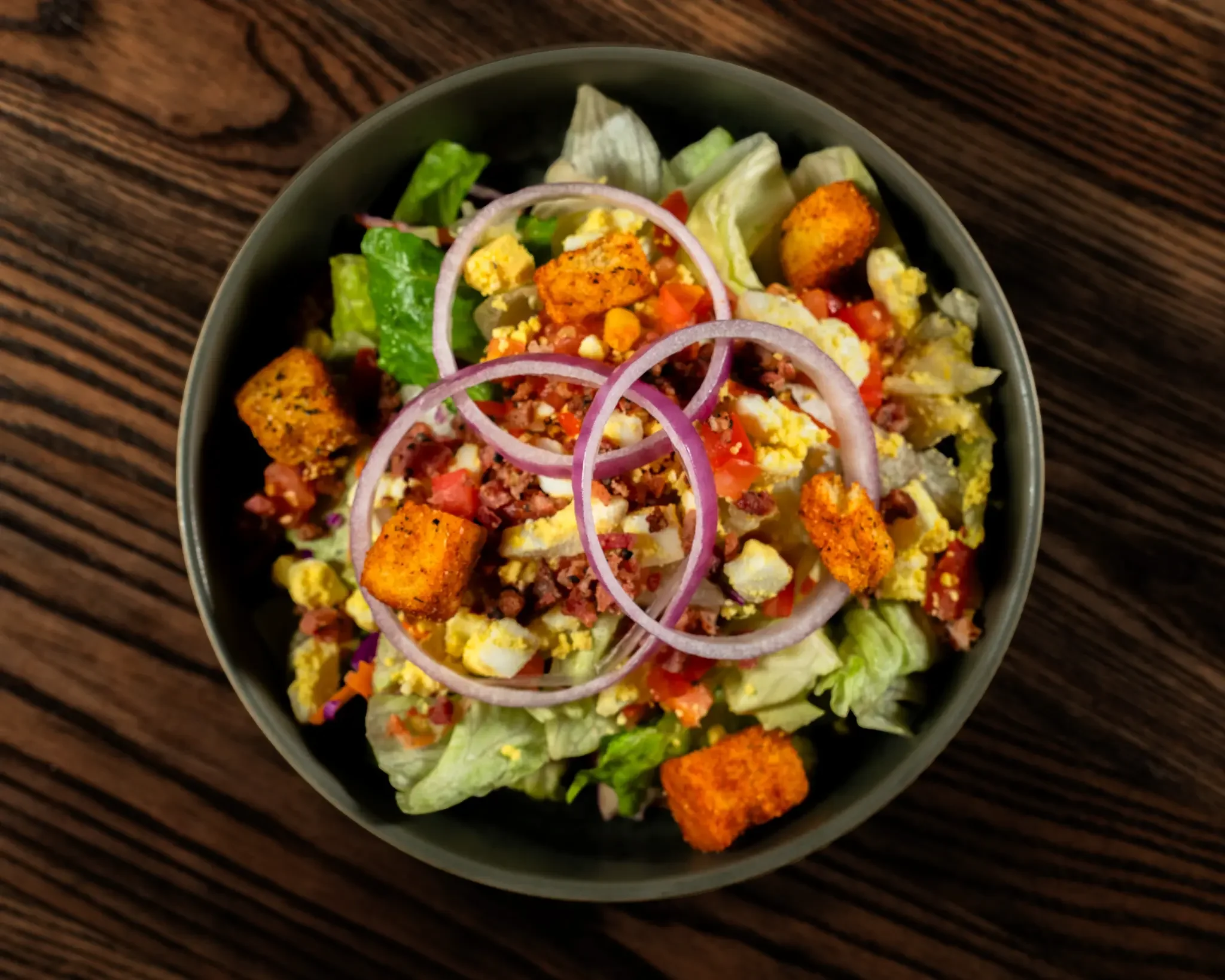 Colorful American Cobb salad with fresh vegetables