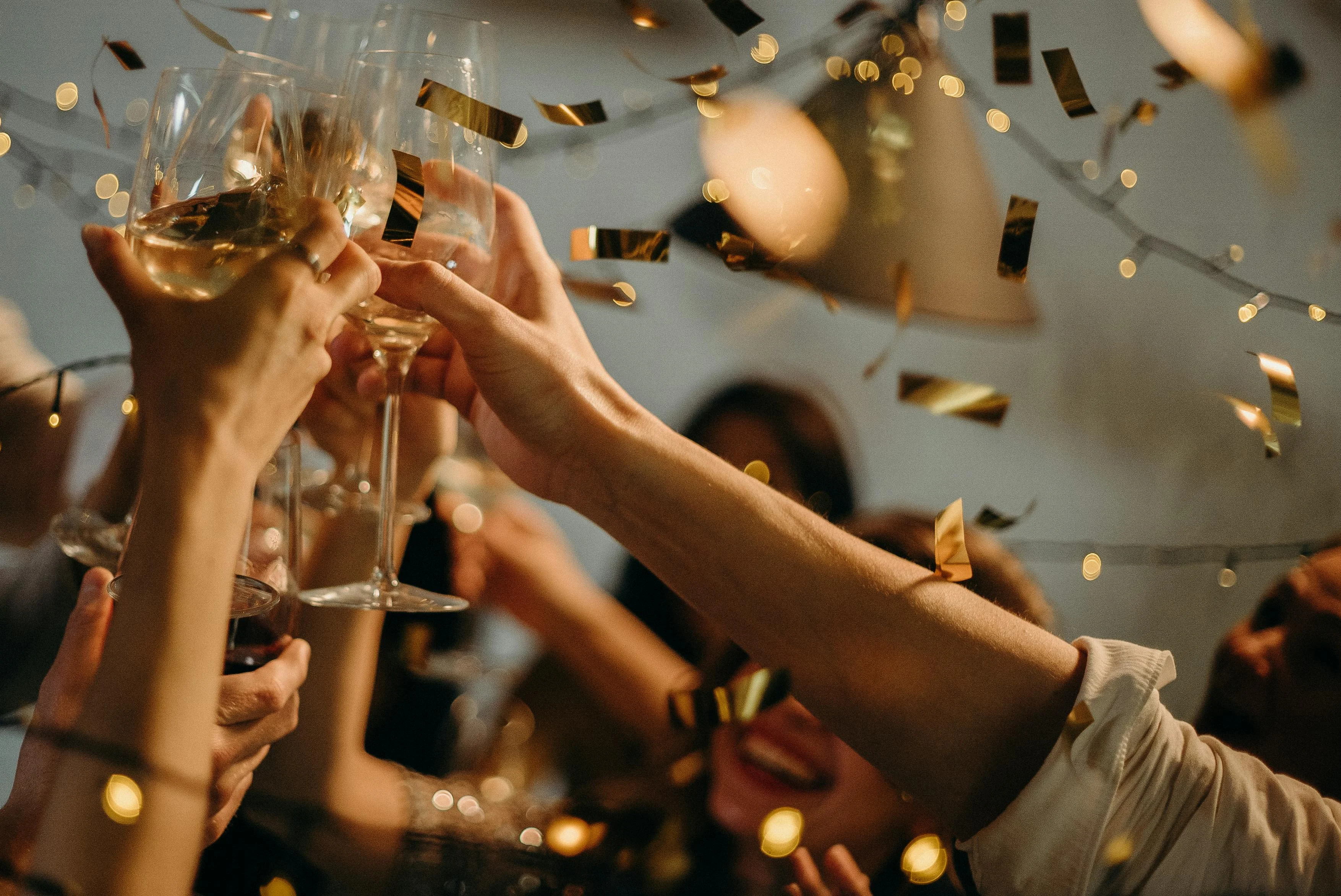 Cheers with champagne glasses at a festive celebration