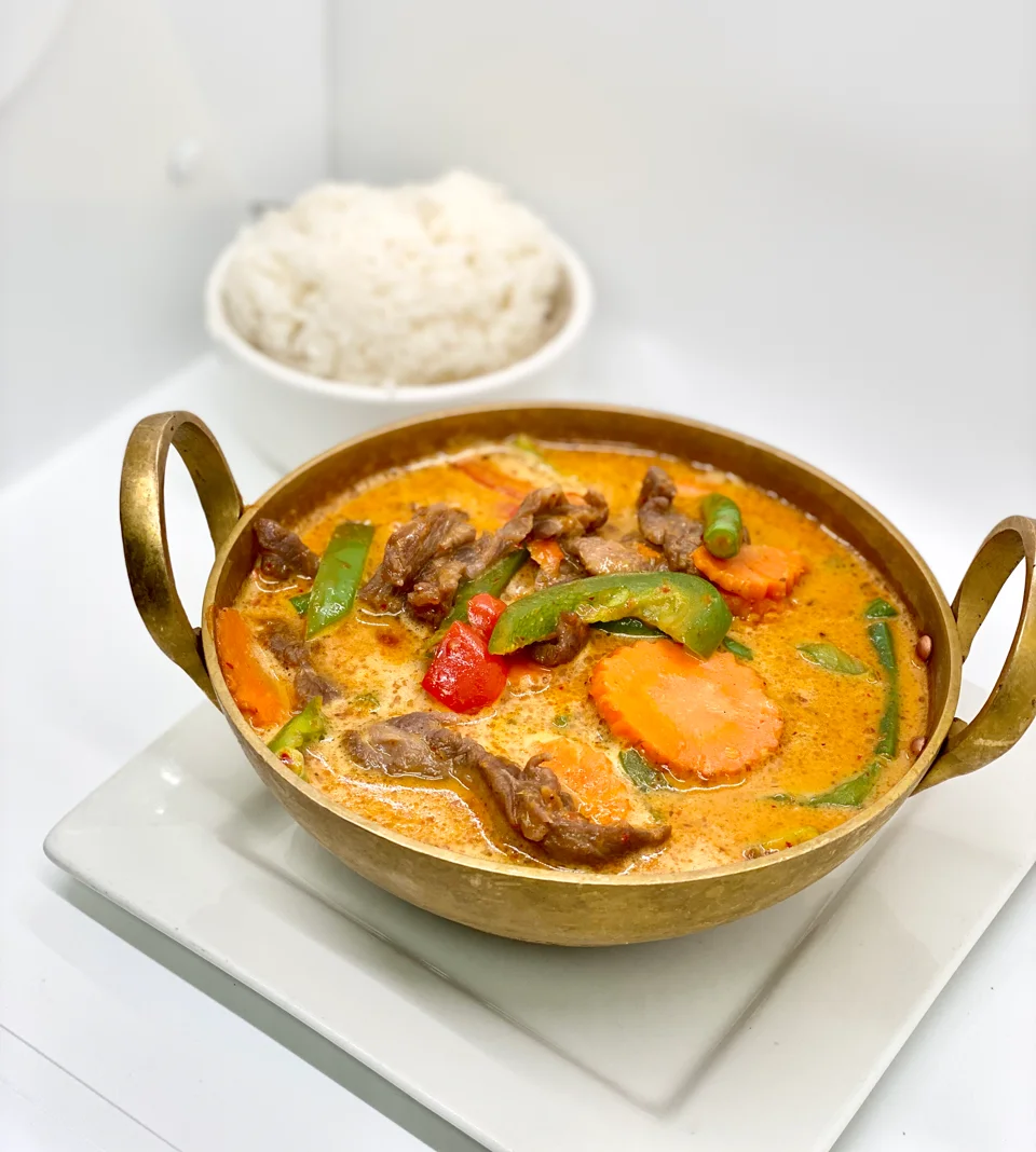 Thai red curry with beef and vegetables served with rice