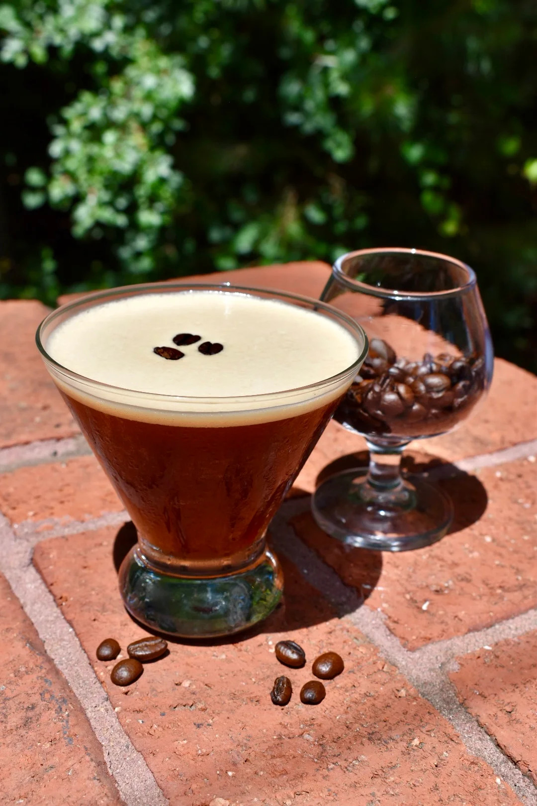 Classic espresso martini garnished with coffee beans