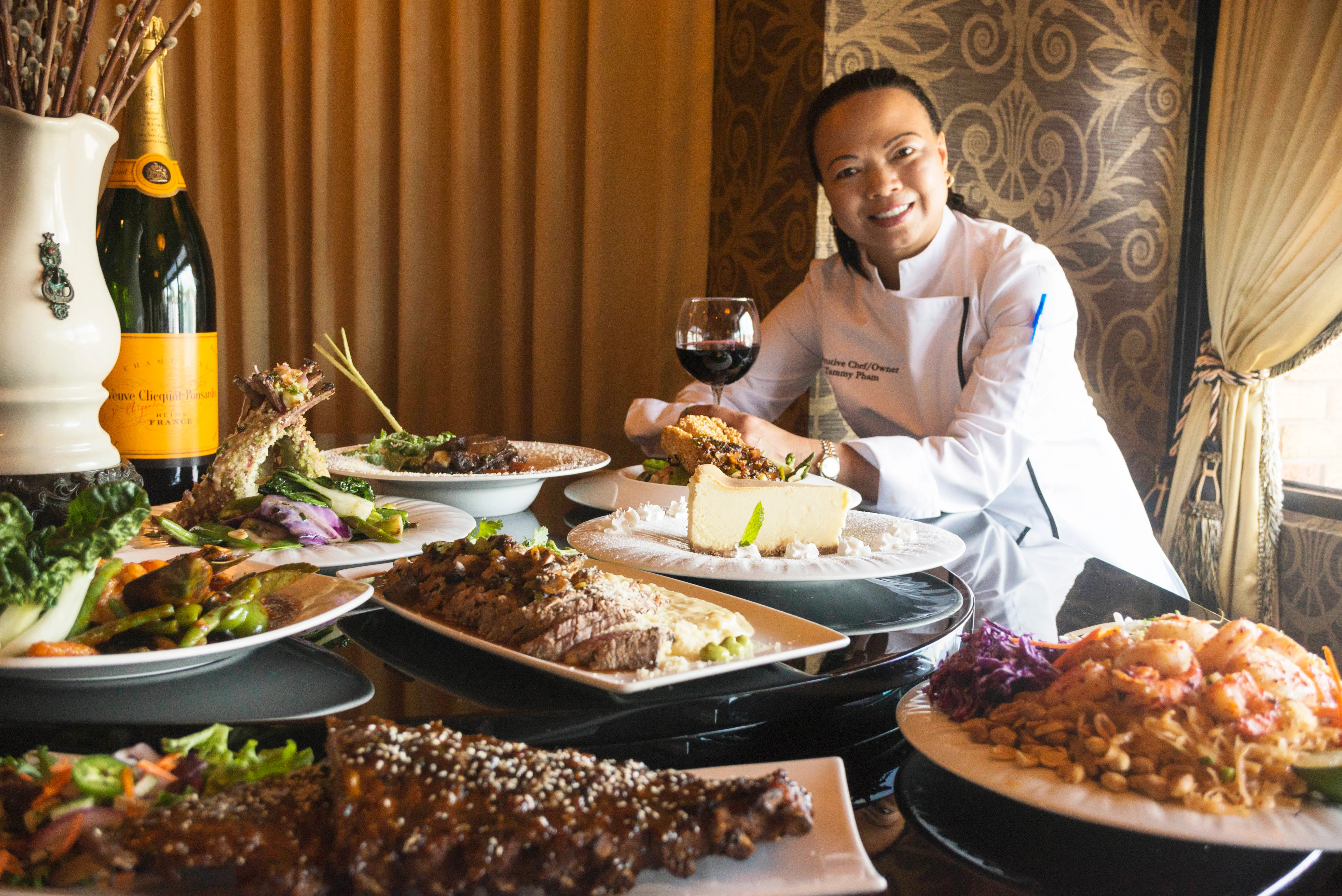 Chef Tammy surrounded by many of her delicious entrees