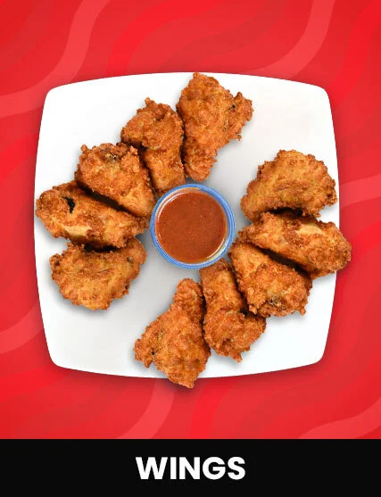 Crispy fried chicken wings served with dipping sauce